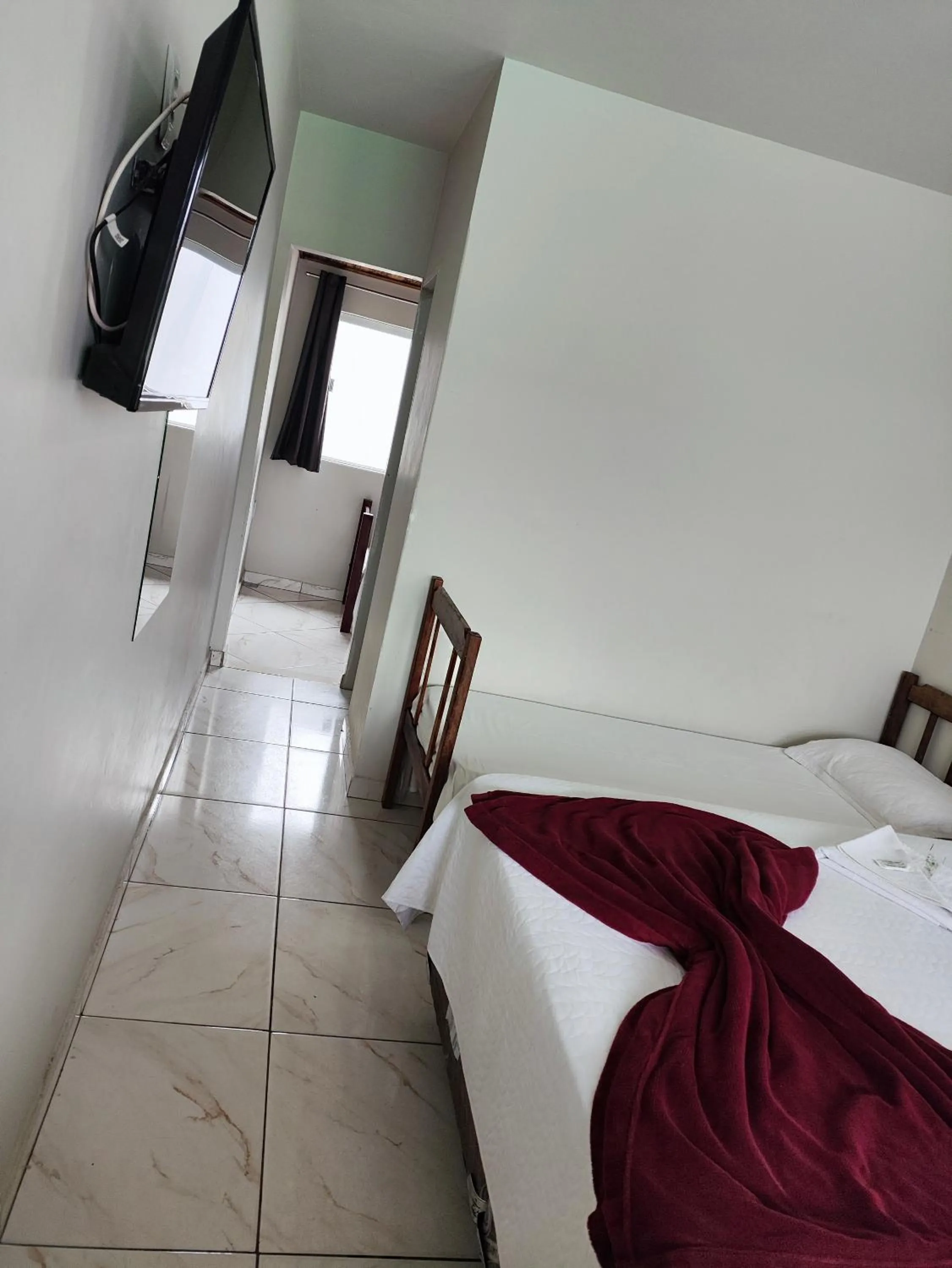 Bed in Pousada Sinhá Moça