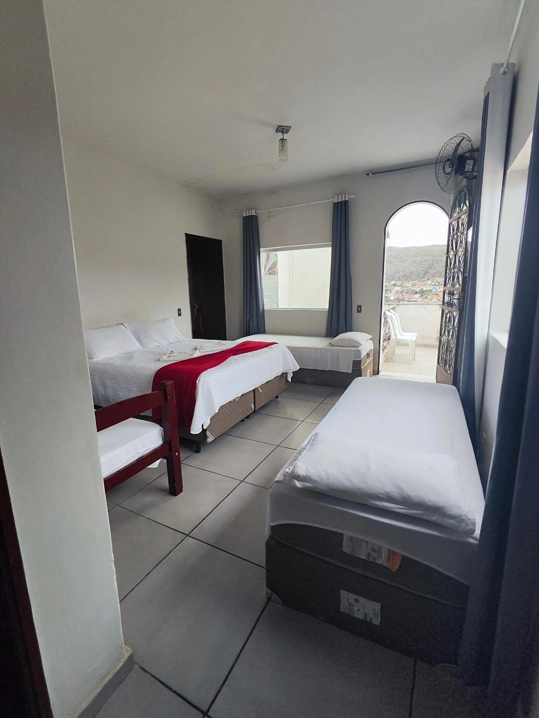 Bed in Pousada Sinhá Moça