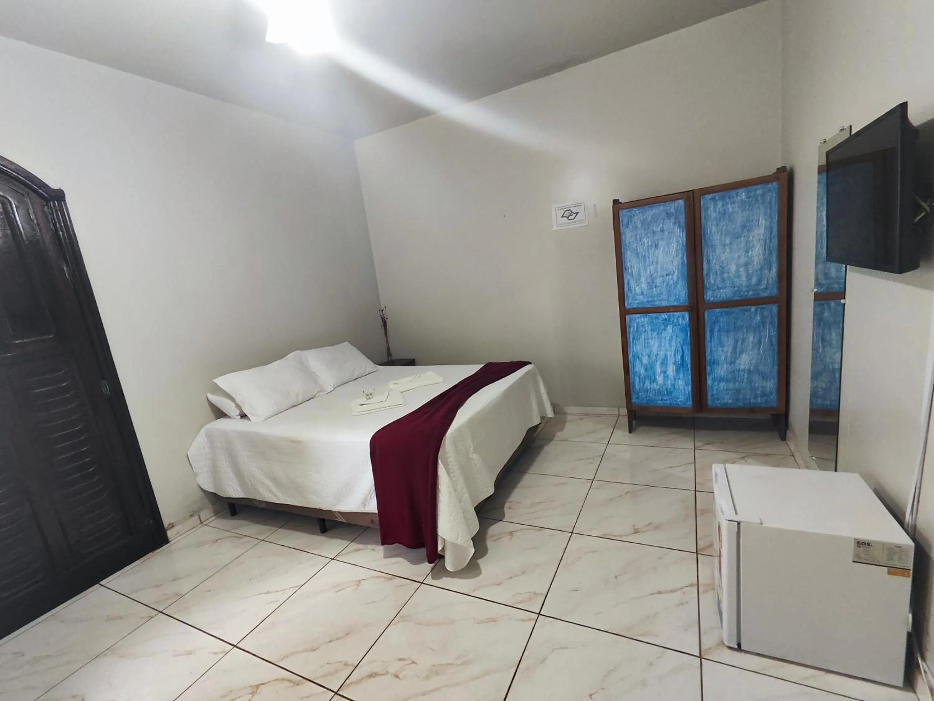 Bed in Pousada Sinhá Moça