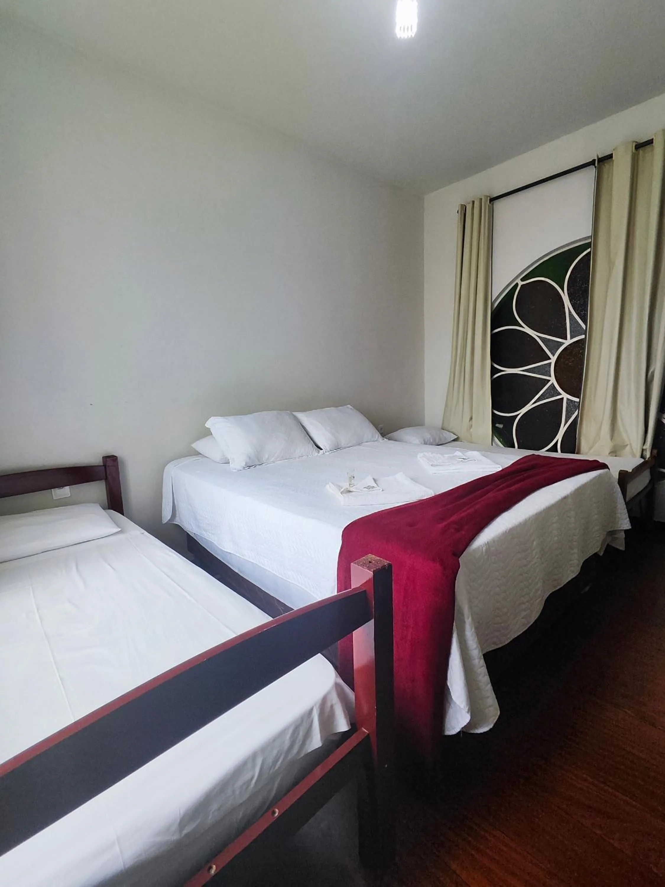 Bed in Pousada Sinhá Moça