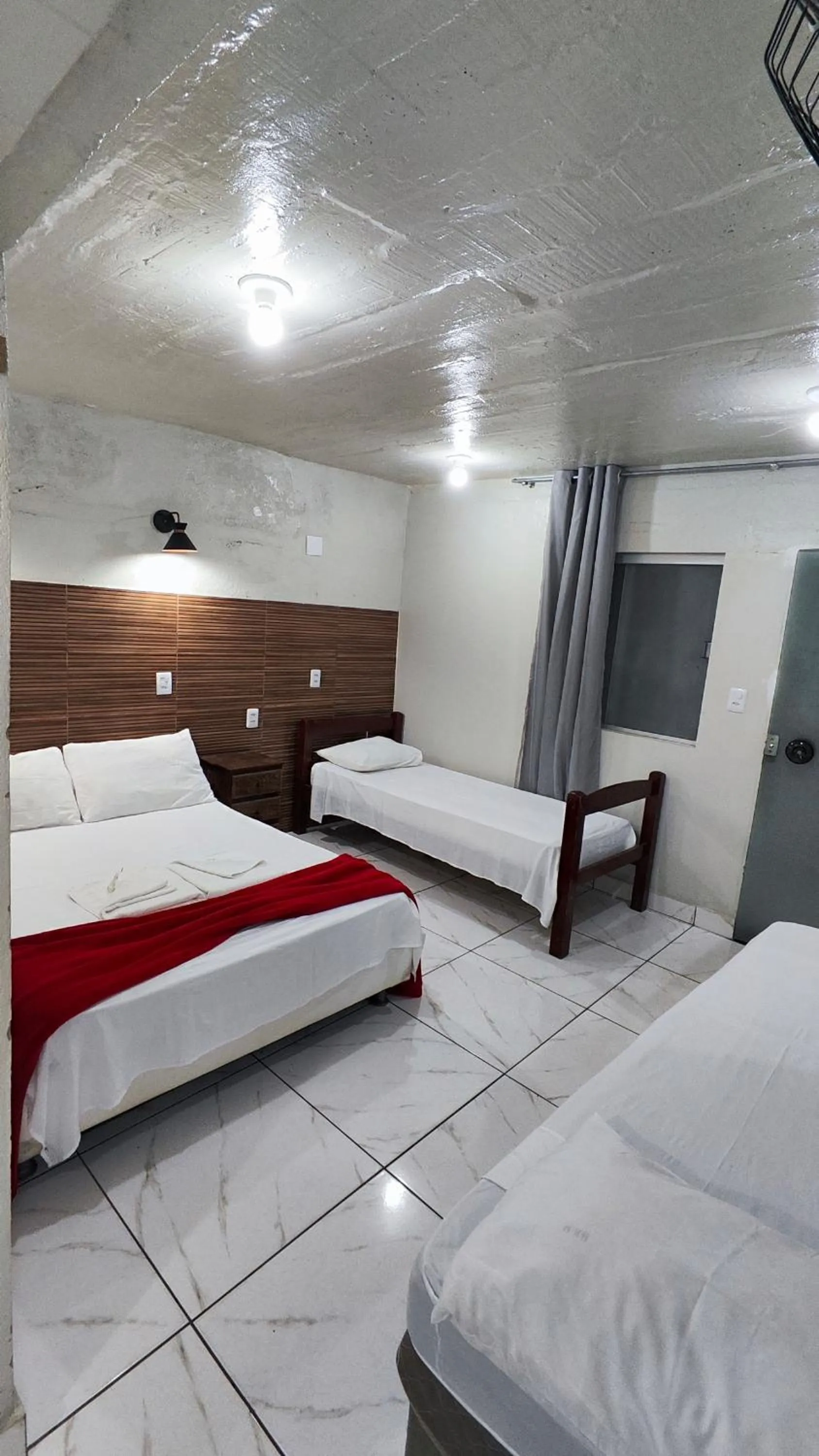 Bed in Pousada Sinhá Moça