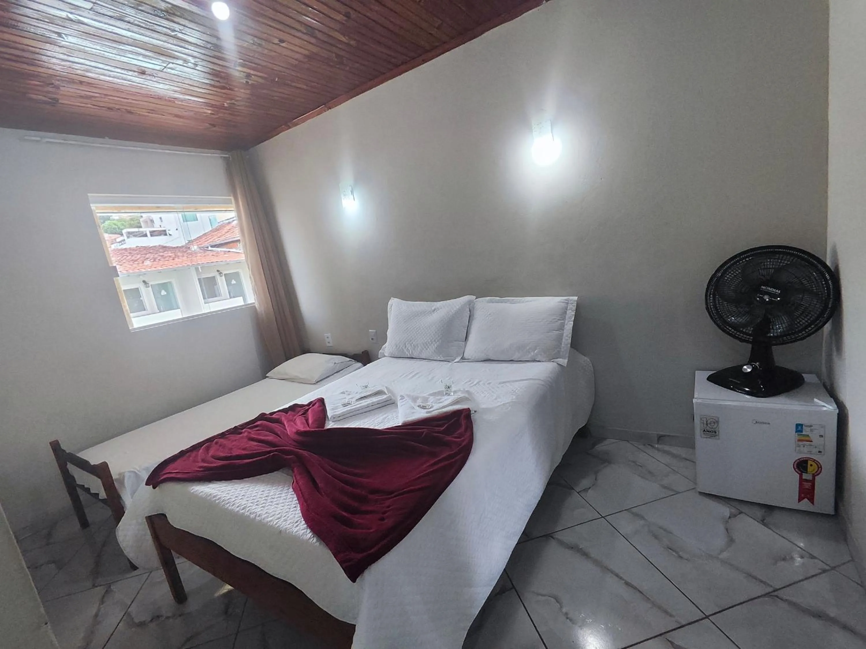 Bed in Pousada Sinhá Moça