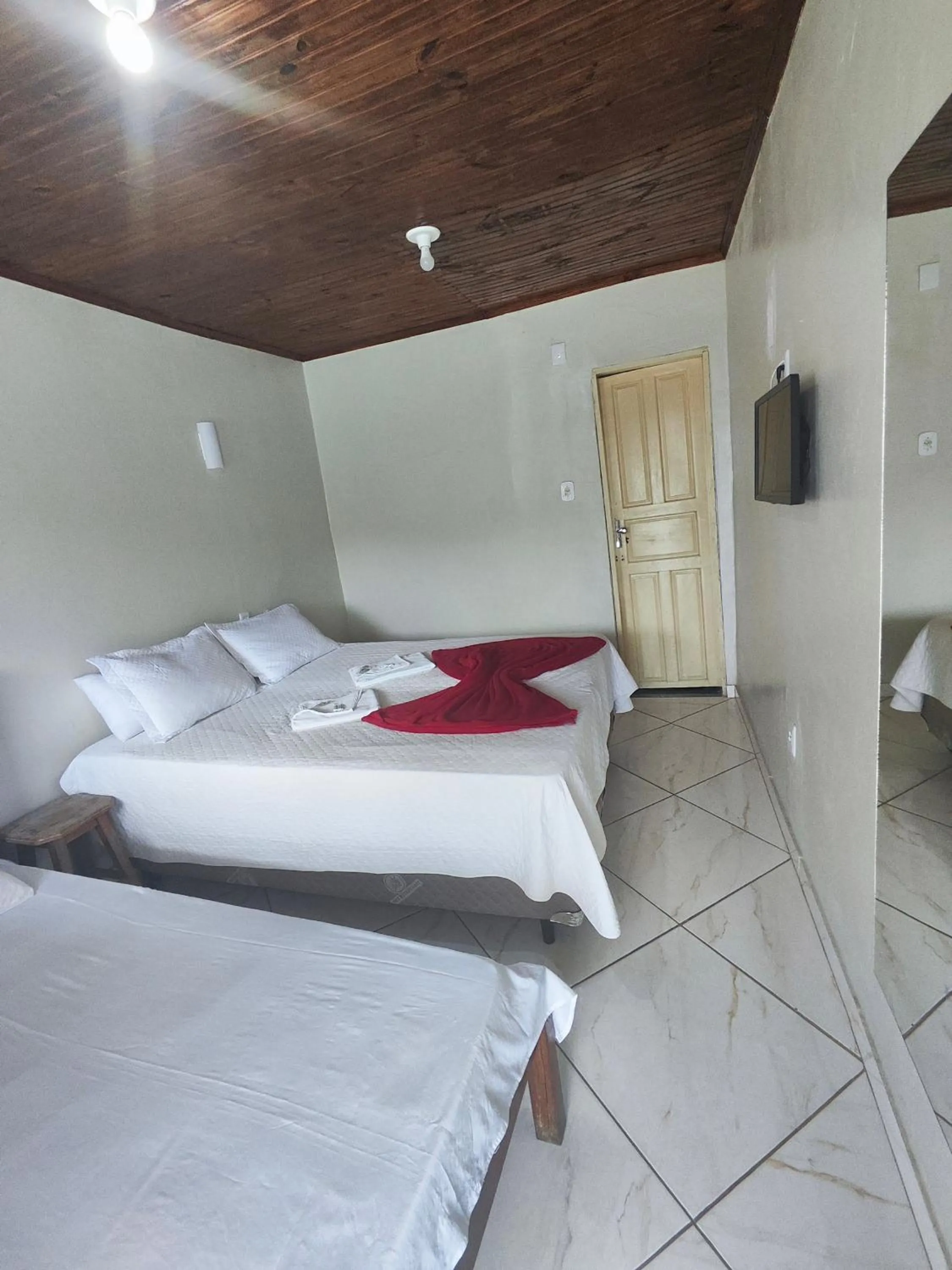 Bed in Pousada Sinhá Moça