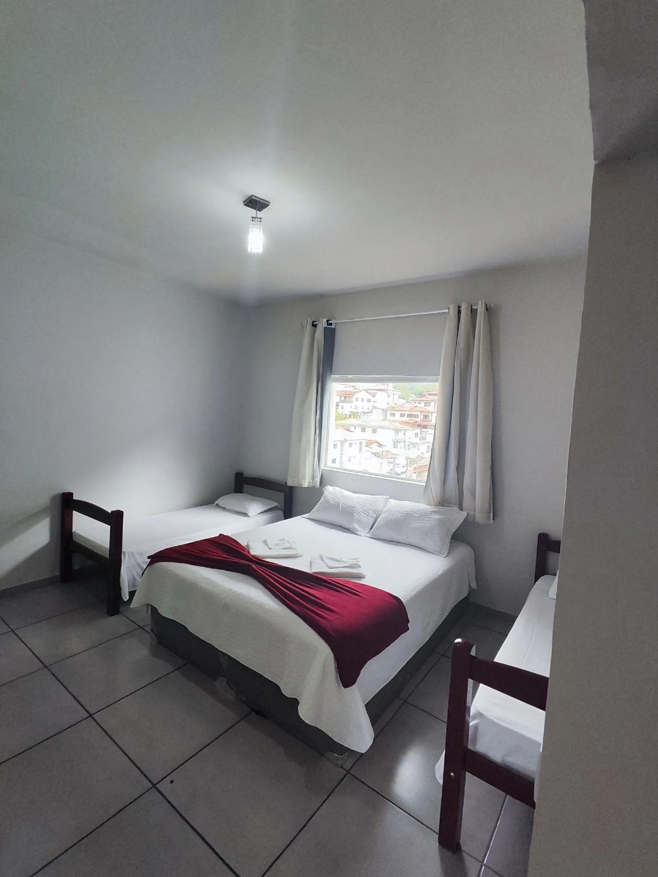 Bed in Pousada Sinhá Moça