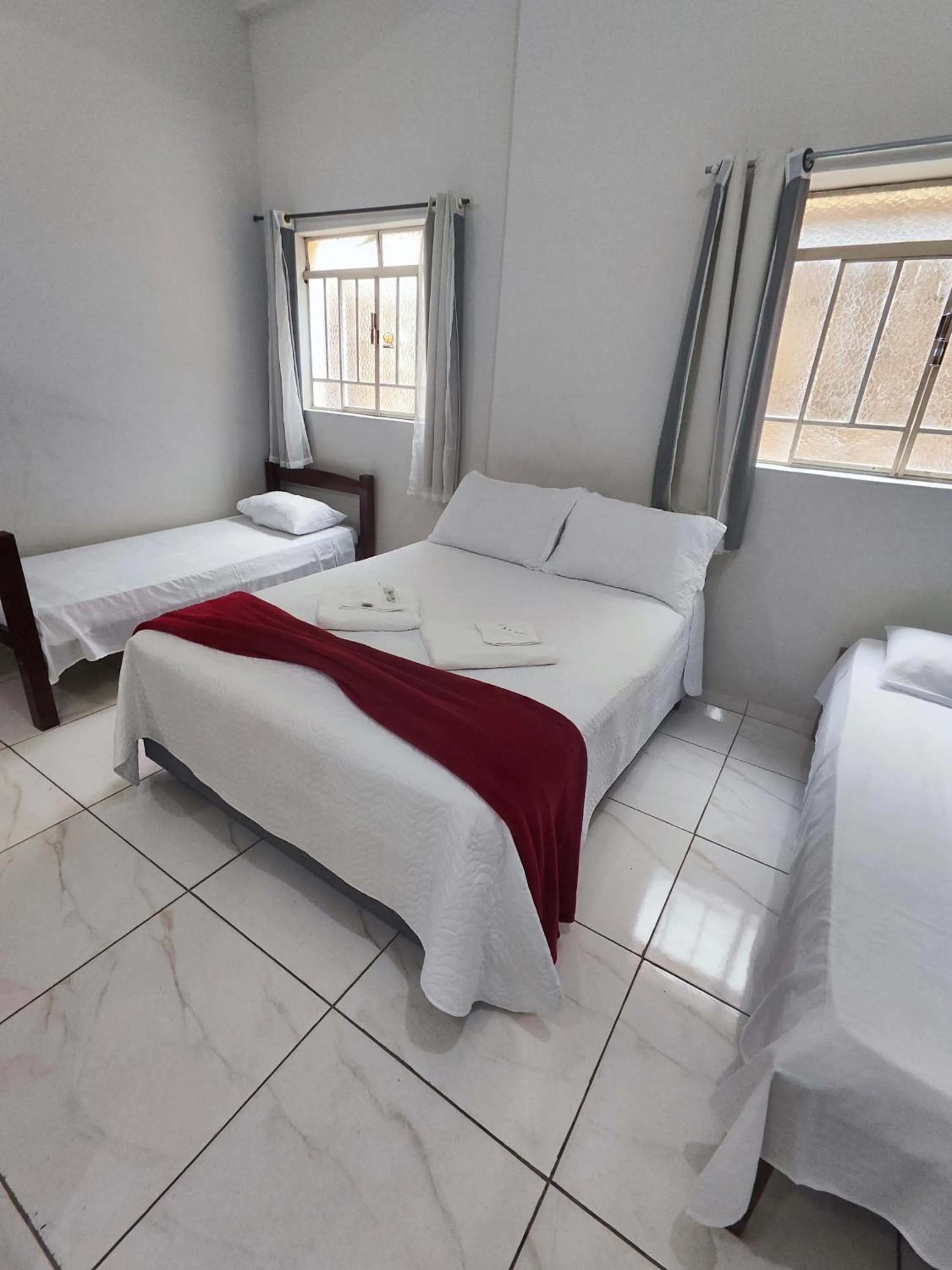 Bed in Pousada Sinhá Moça