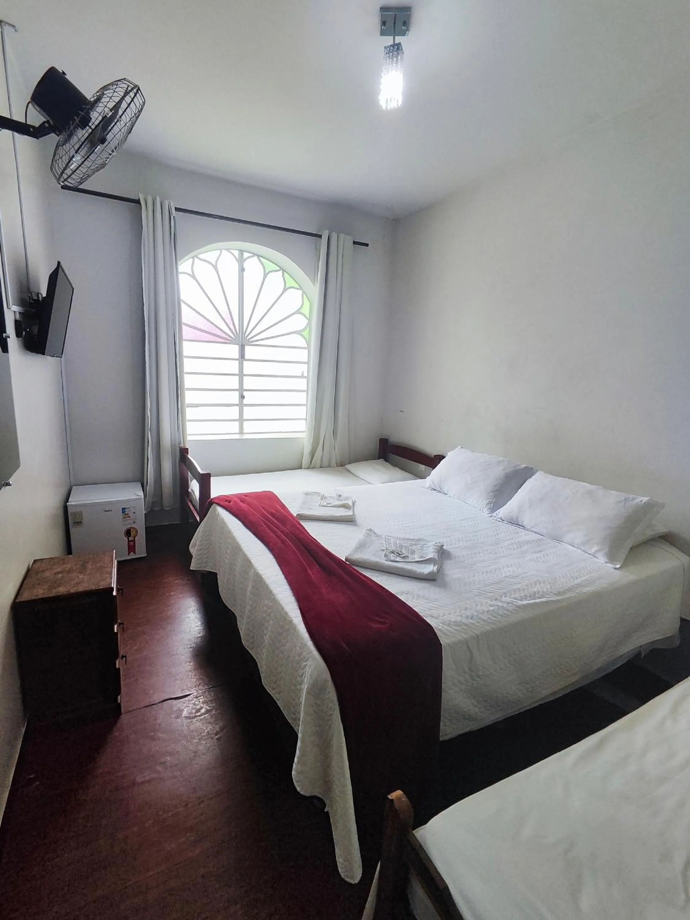 Bed in Pousada Sinhá Moça