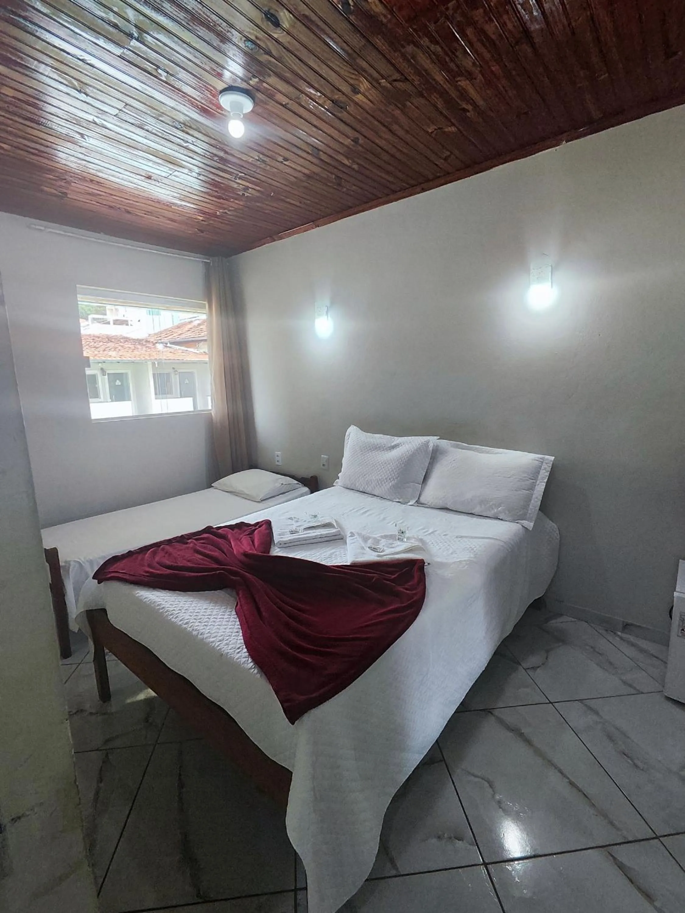 Bed in Pousada Sinhá Moça