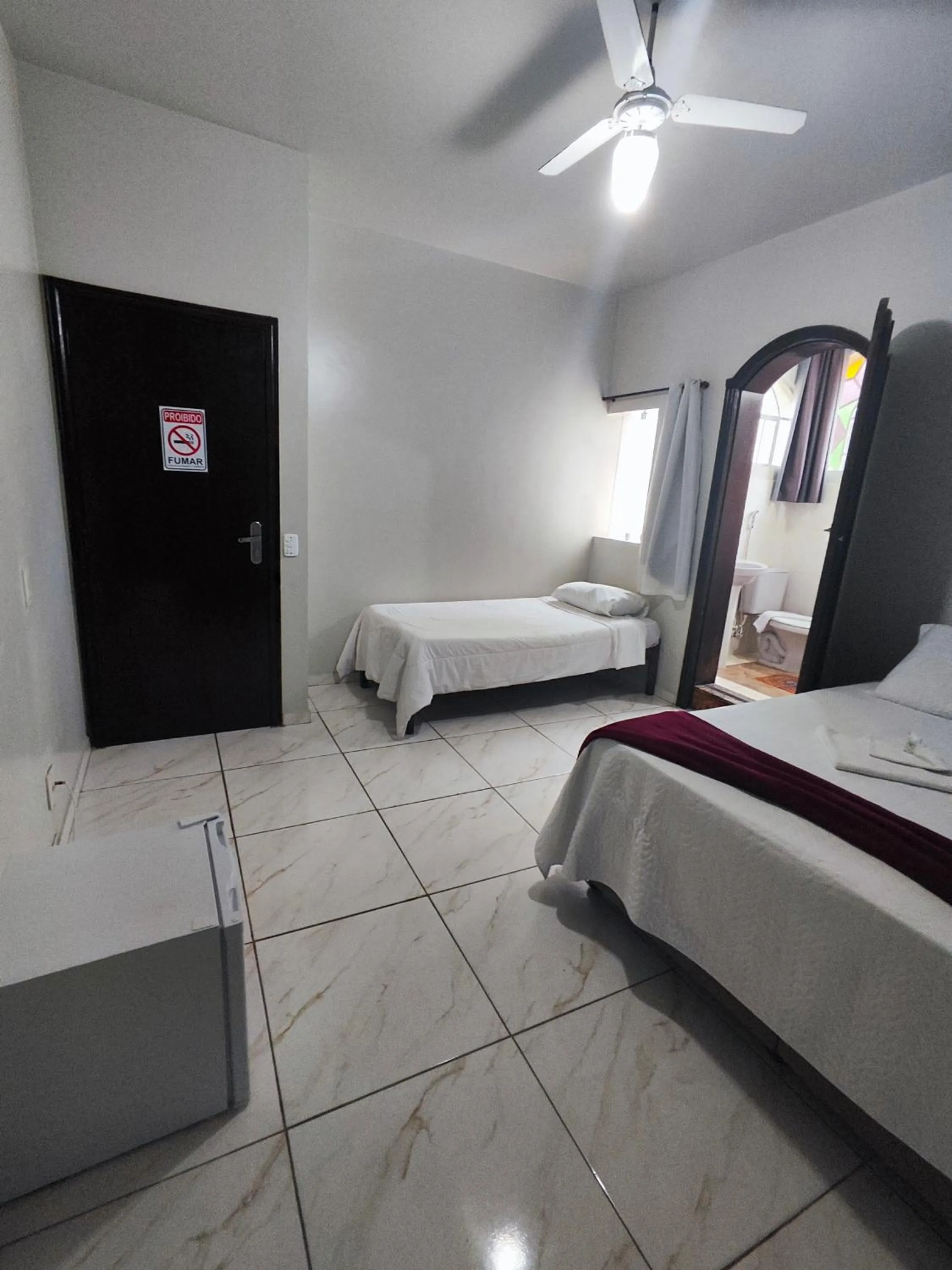 Bed in Pousada Sinhá Moça
