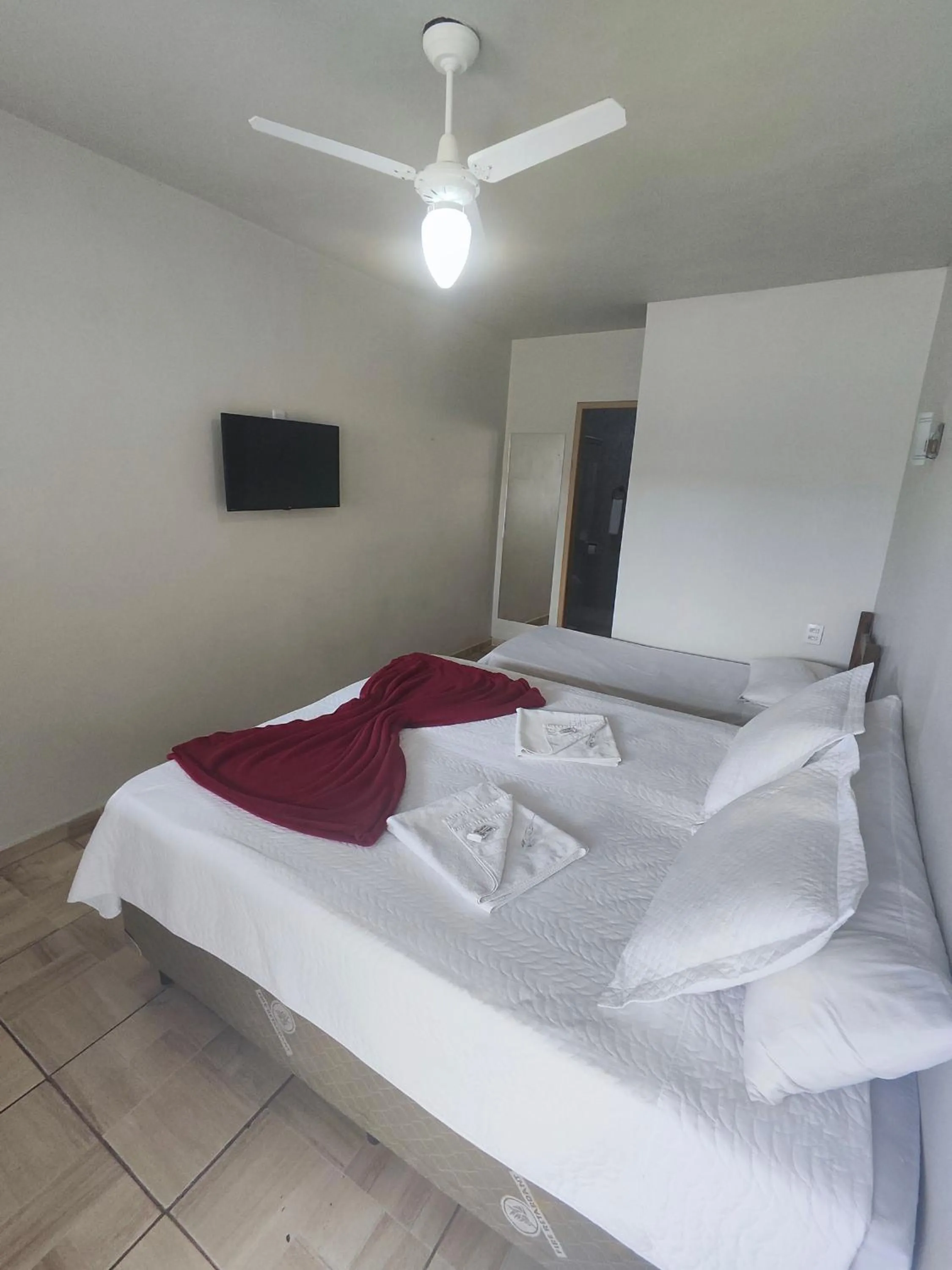Bed in Pousada Sinhá Moça