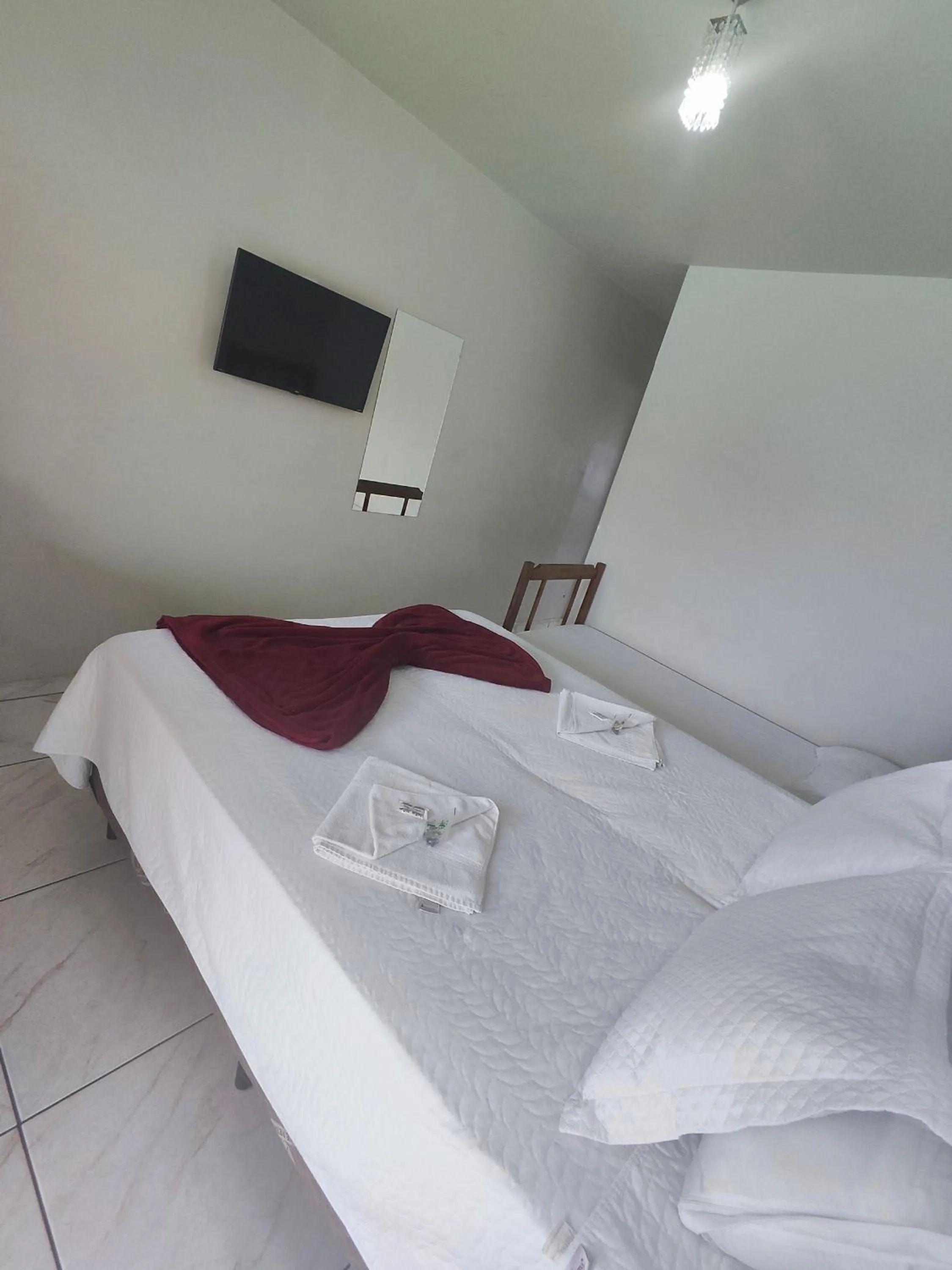 Bed in Pousada Sinhá Moça