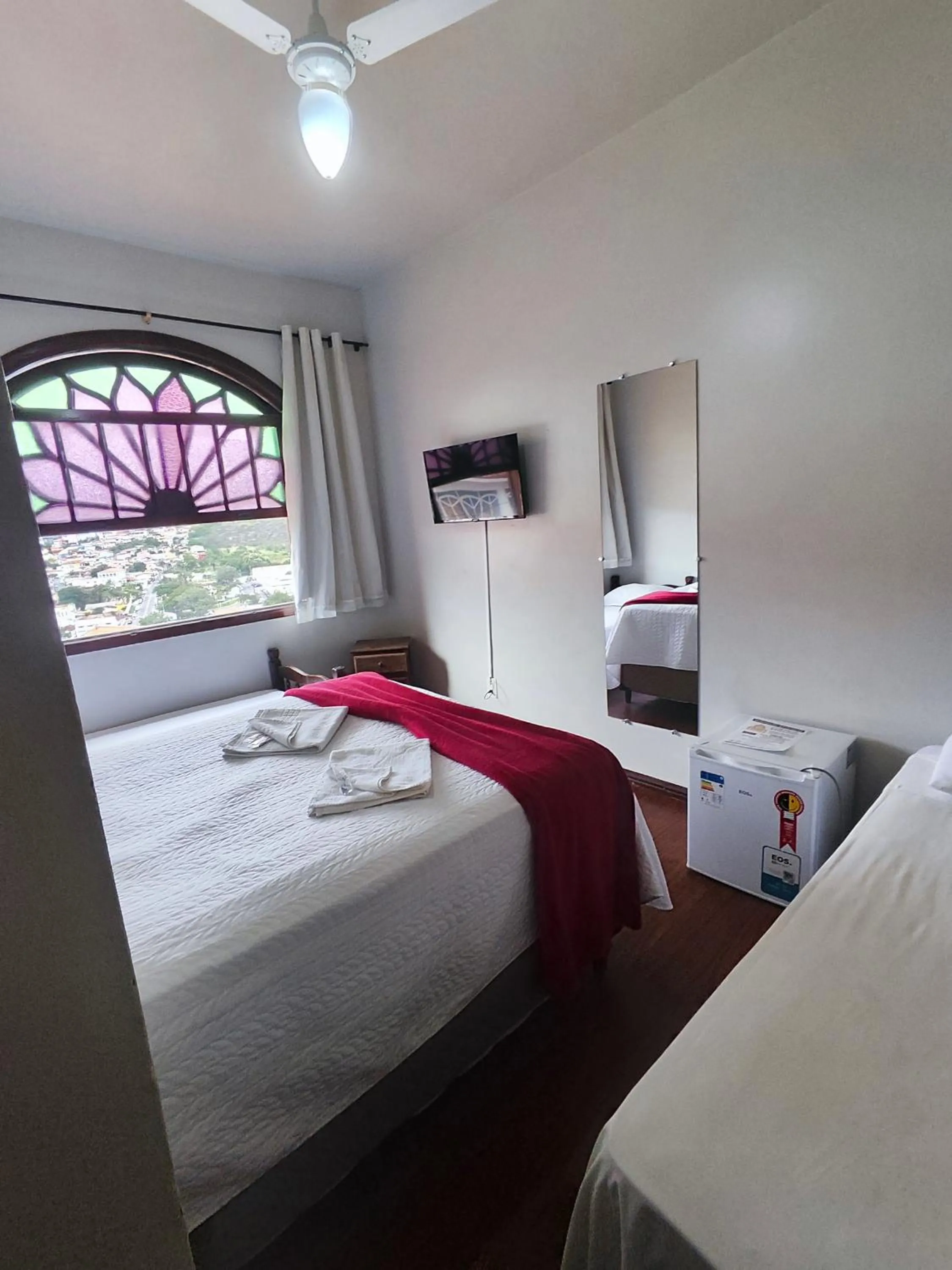 Bed in Pousada Sinhá Moça
