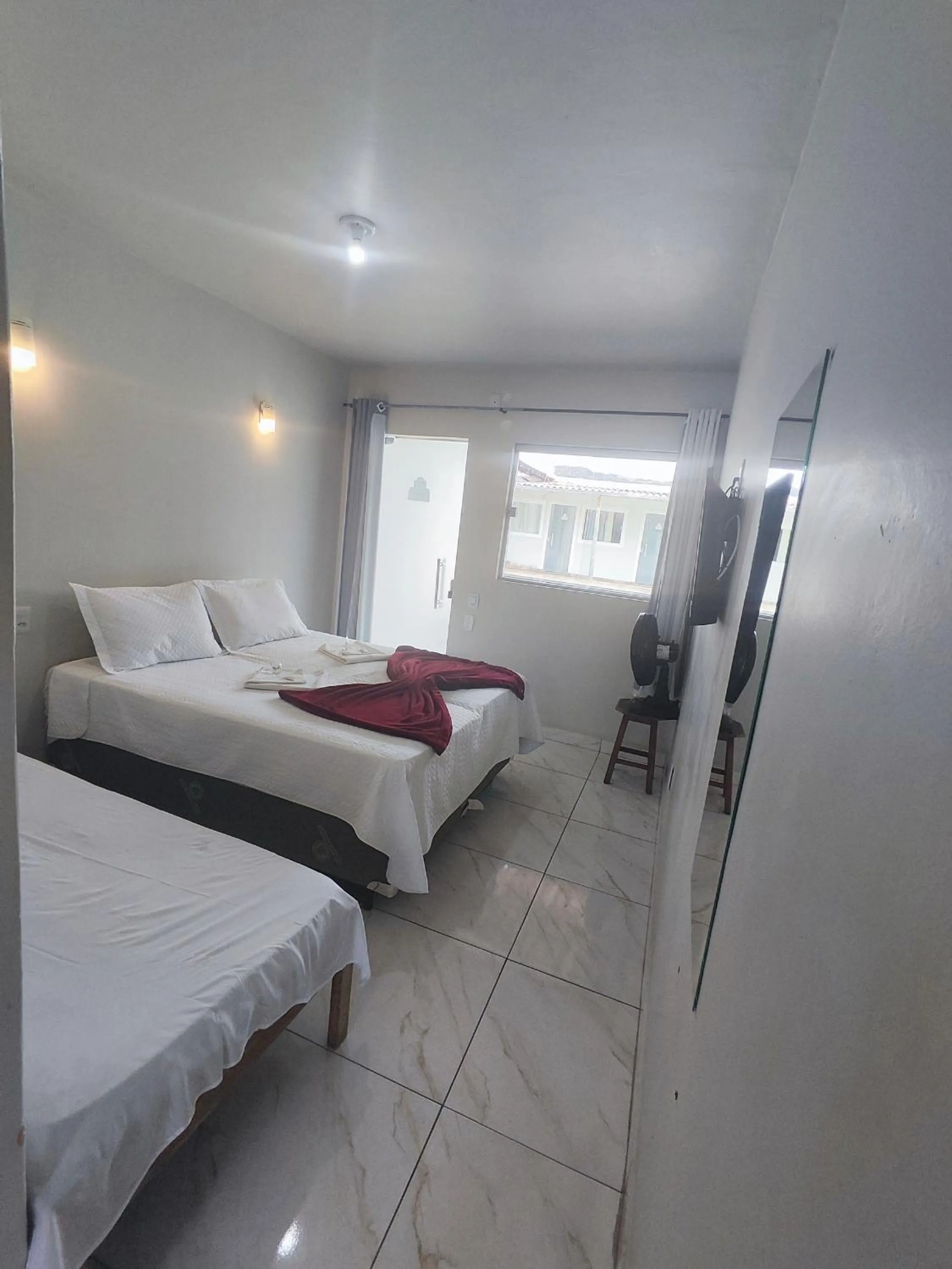 Bed in Pousada Sinhá Moça