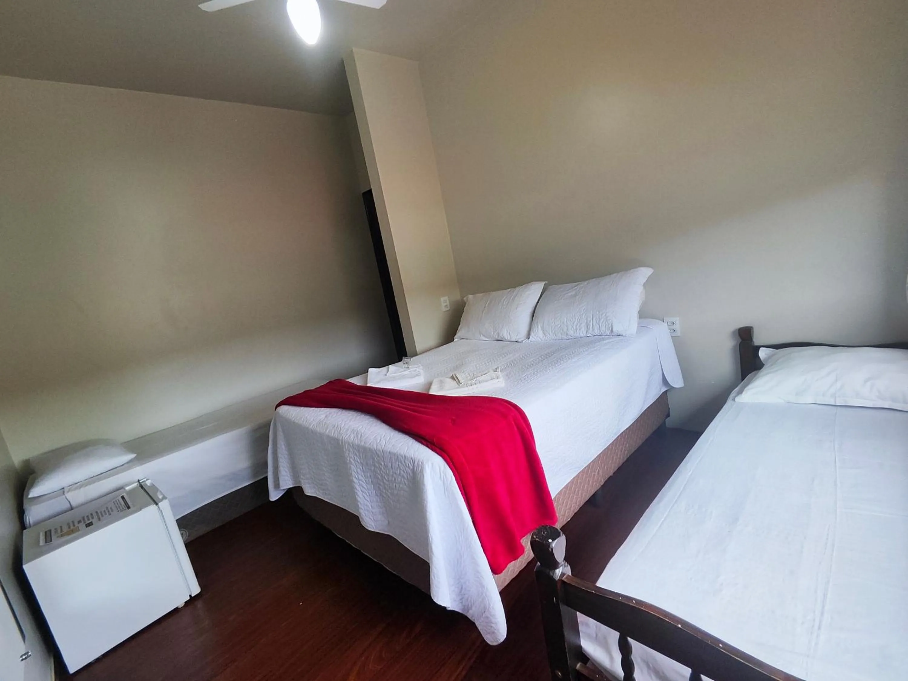 Bed in Pousada Sinhá Moça