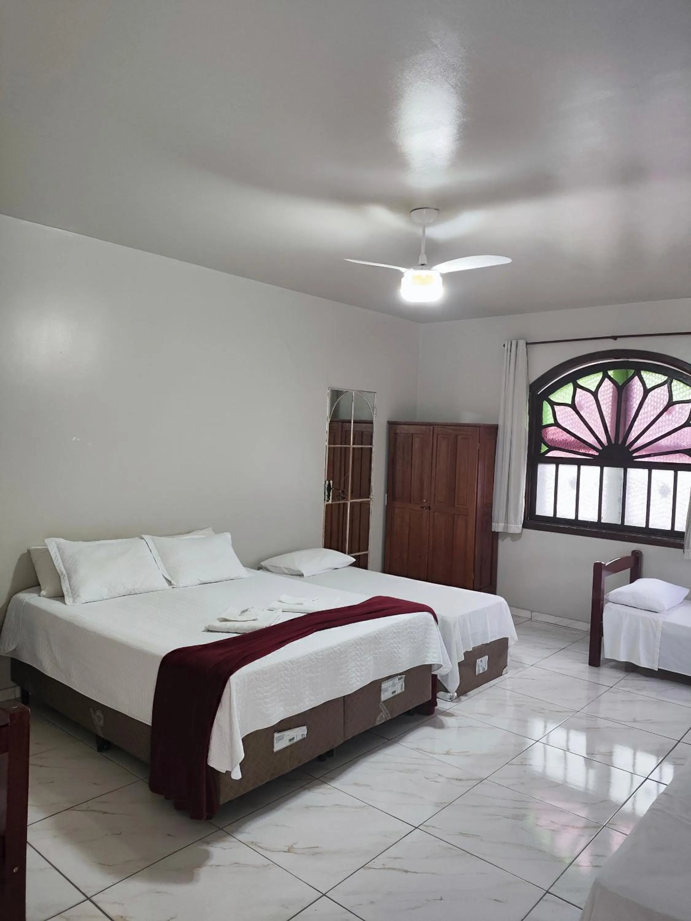 Bed in Pousada Sinhá Moça