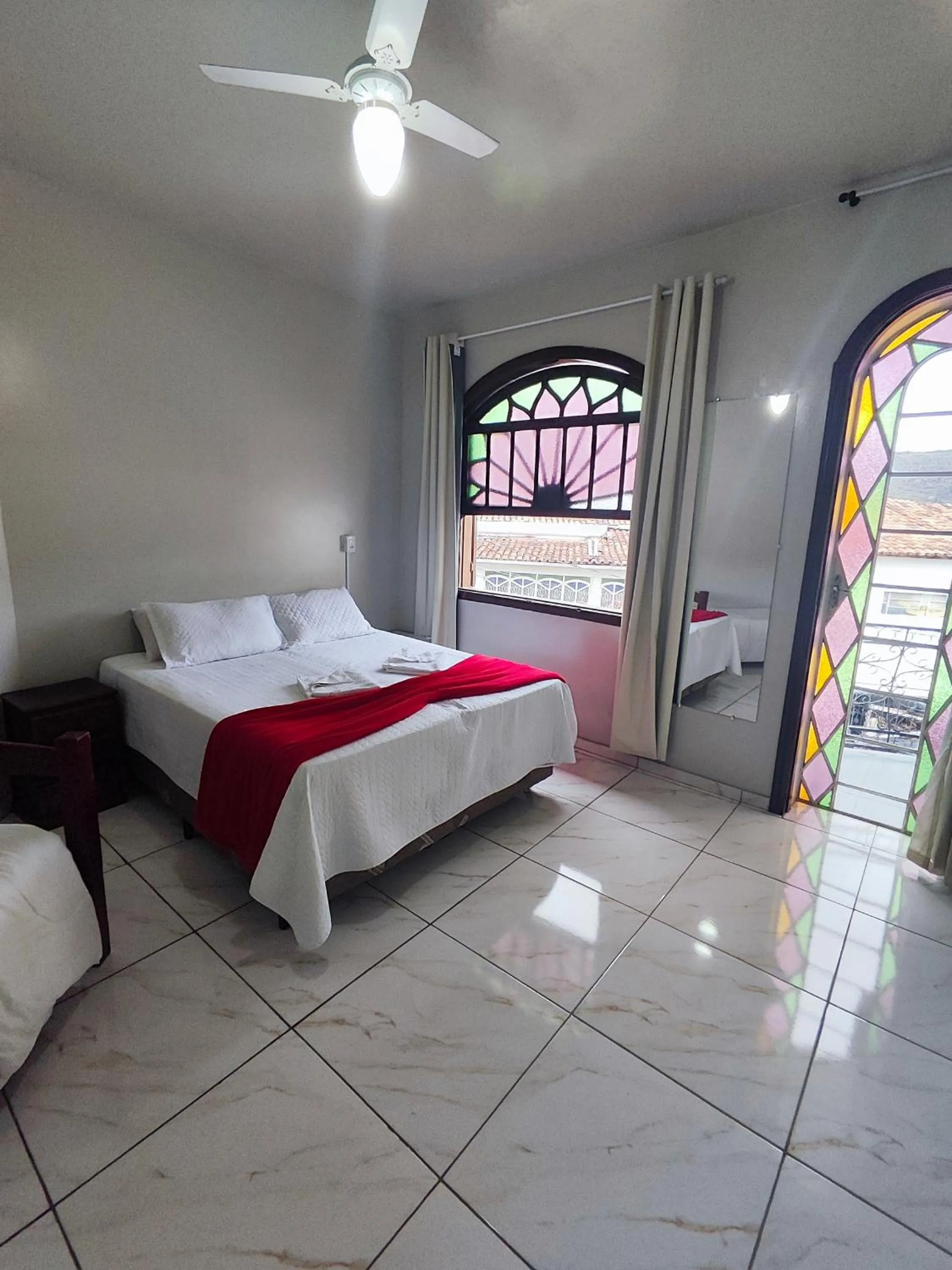 Bed in Pousada Sinhá Moça