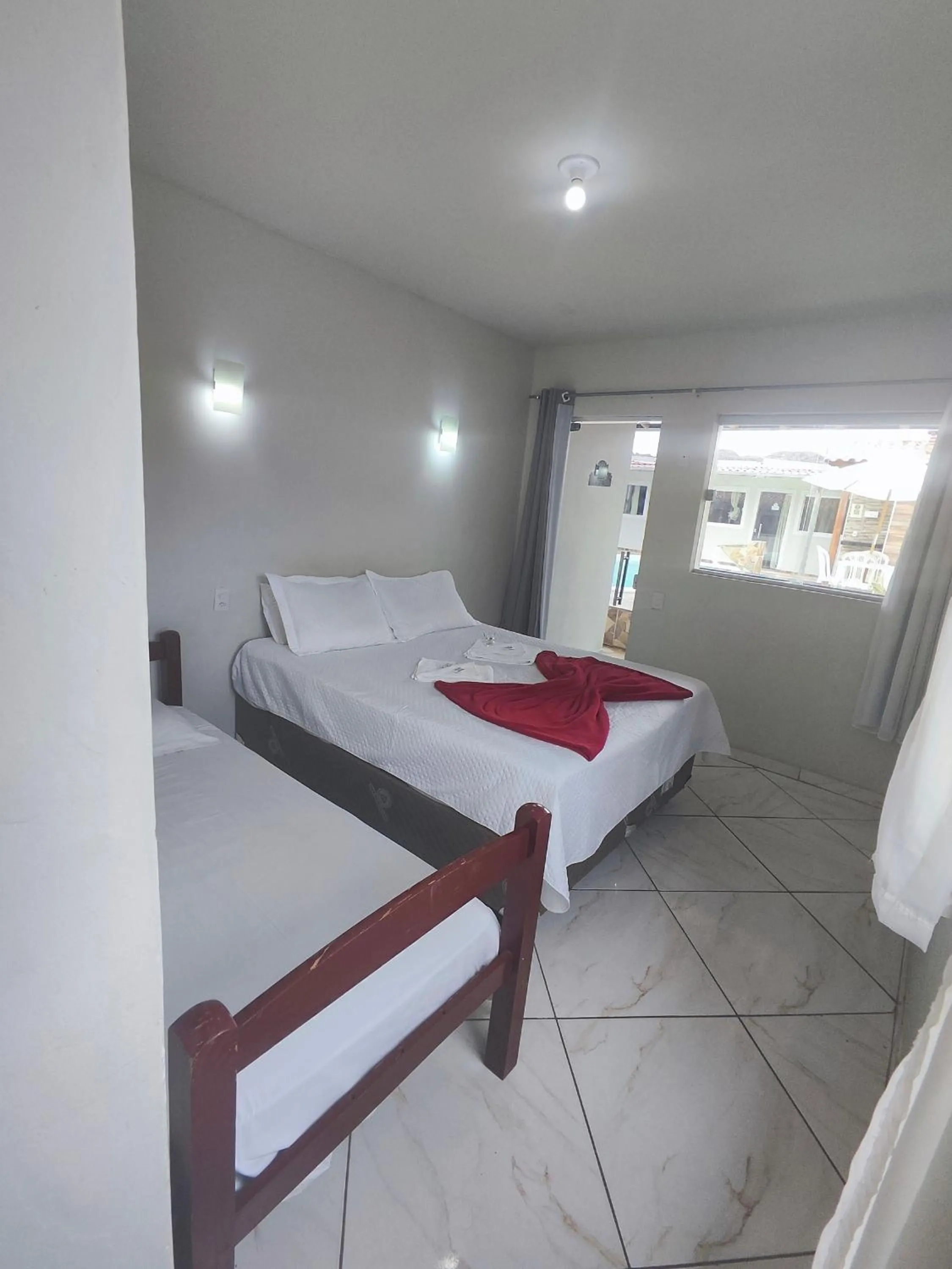 Bed in Pousada Sinhá Moça