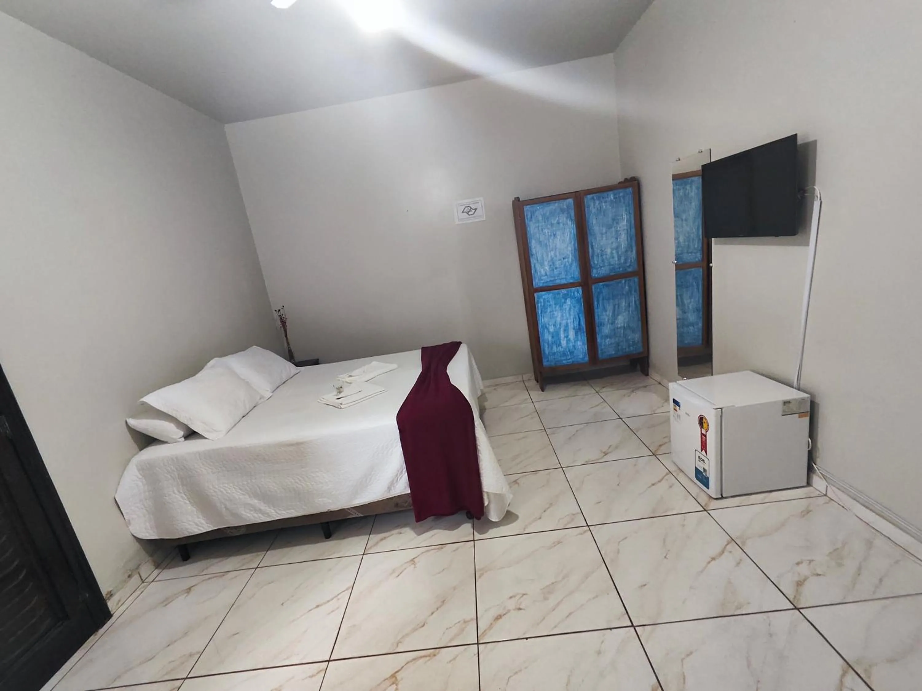 Bed in Pousada Sinhá Moça