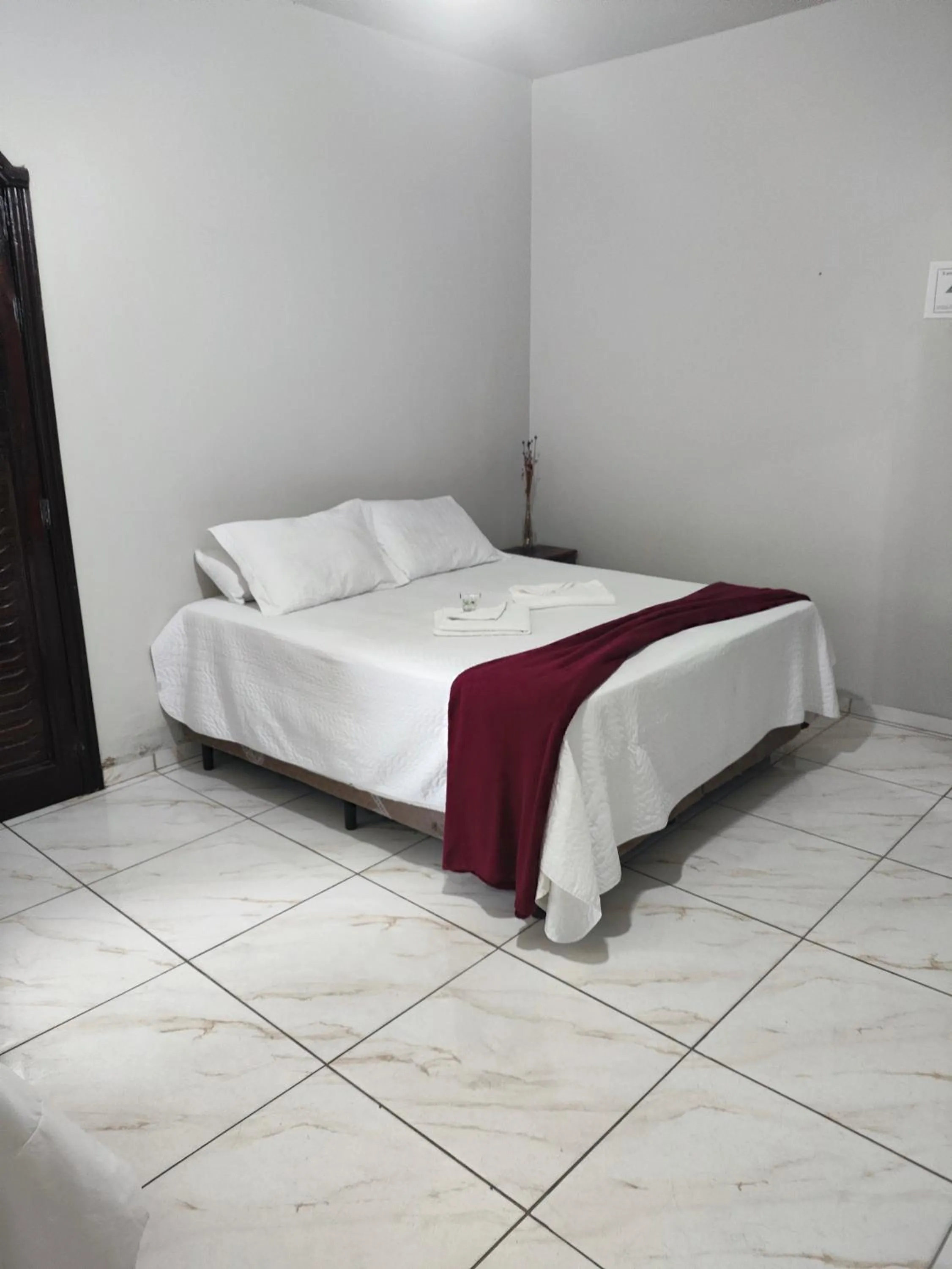 Bed in Pousada Sinhá Moça