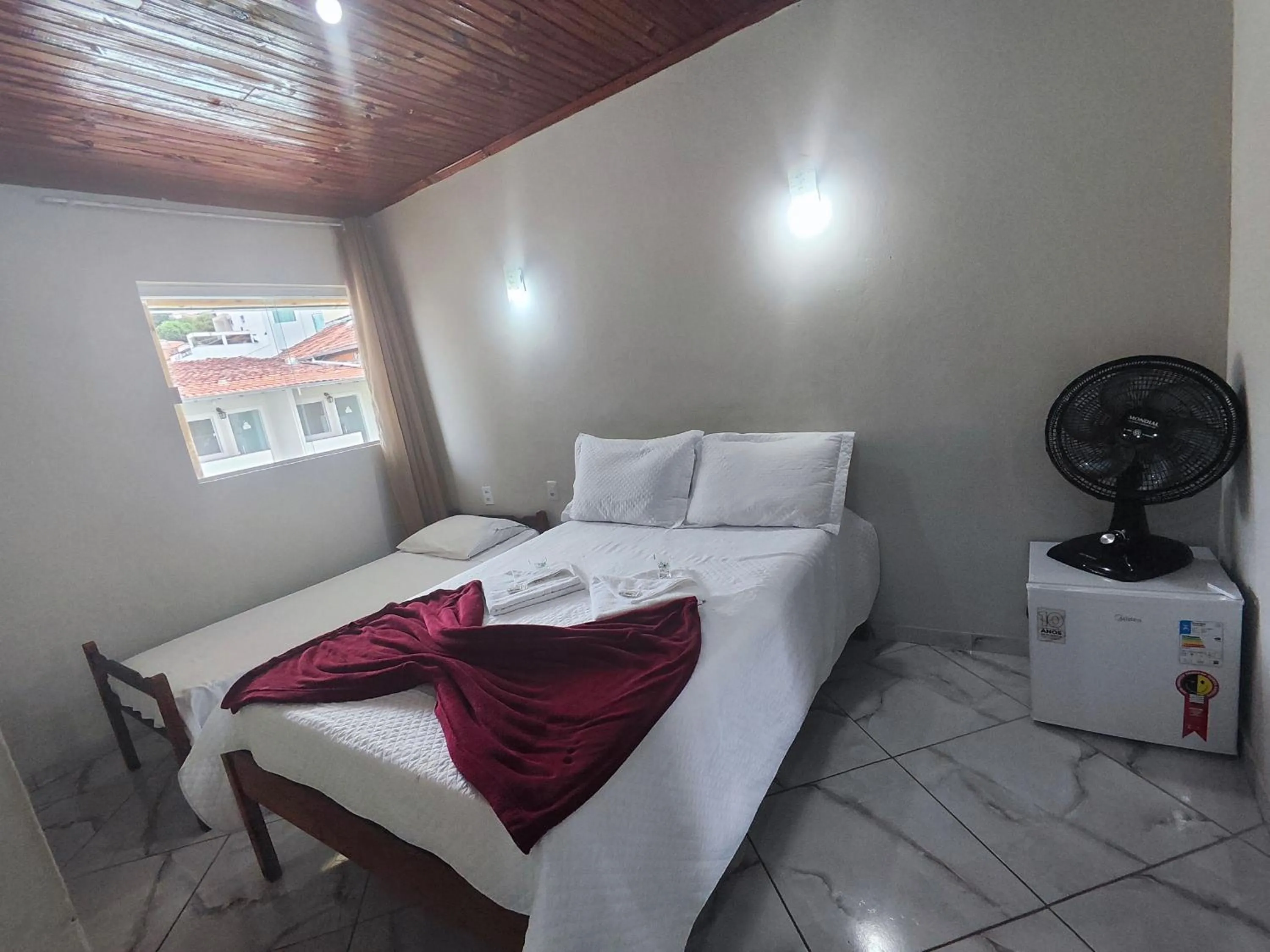 Bed in Pousada Sinhá Moça