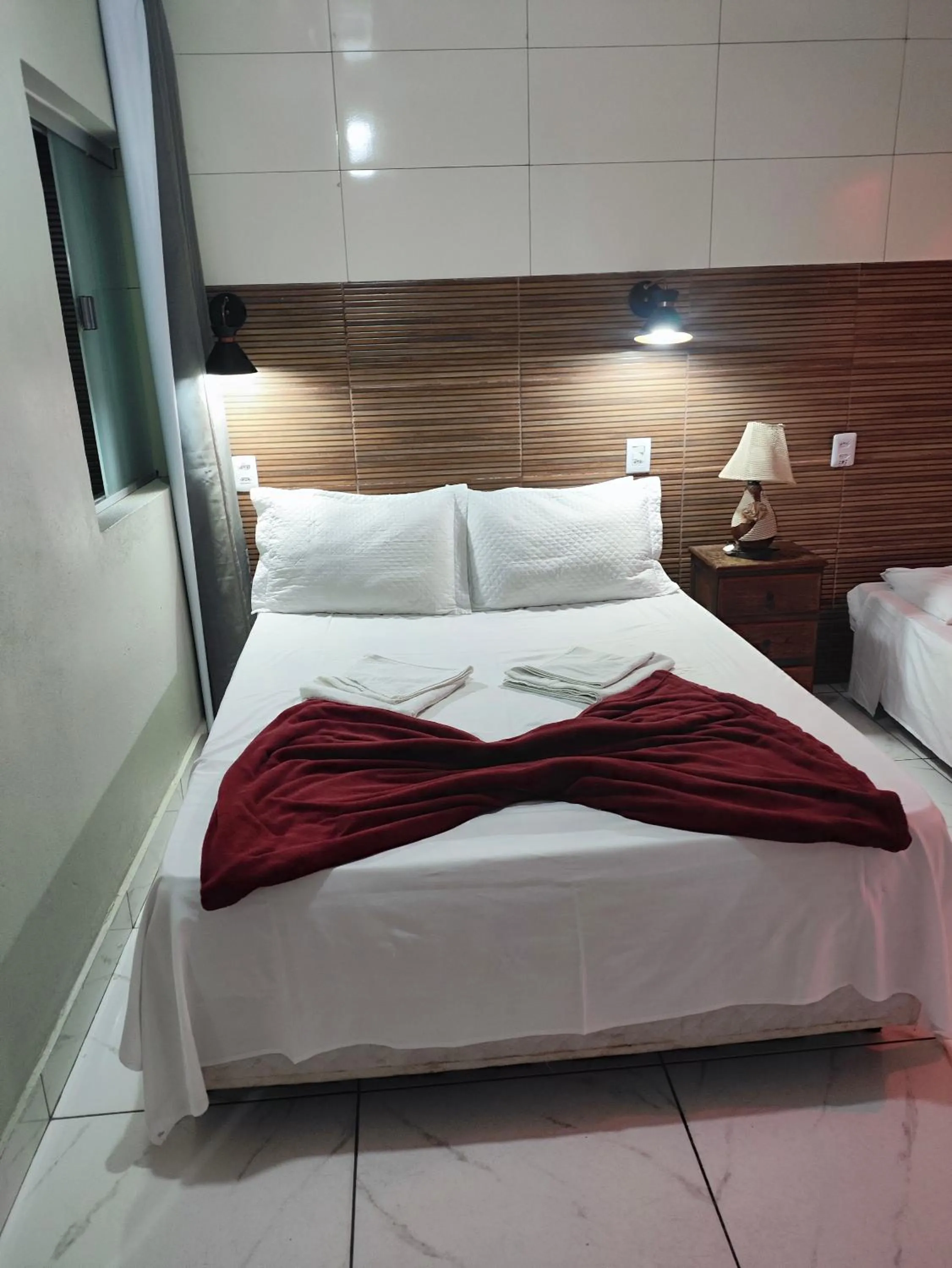Bed in Pousada Sinhá Moça