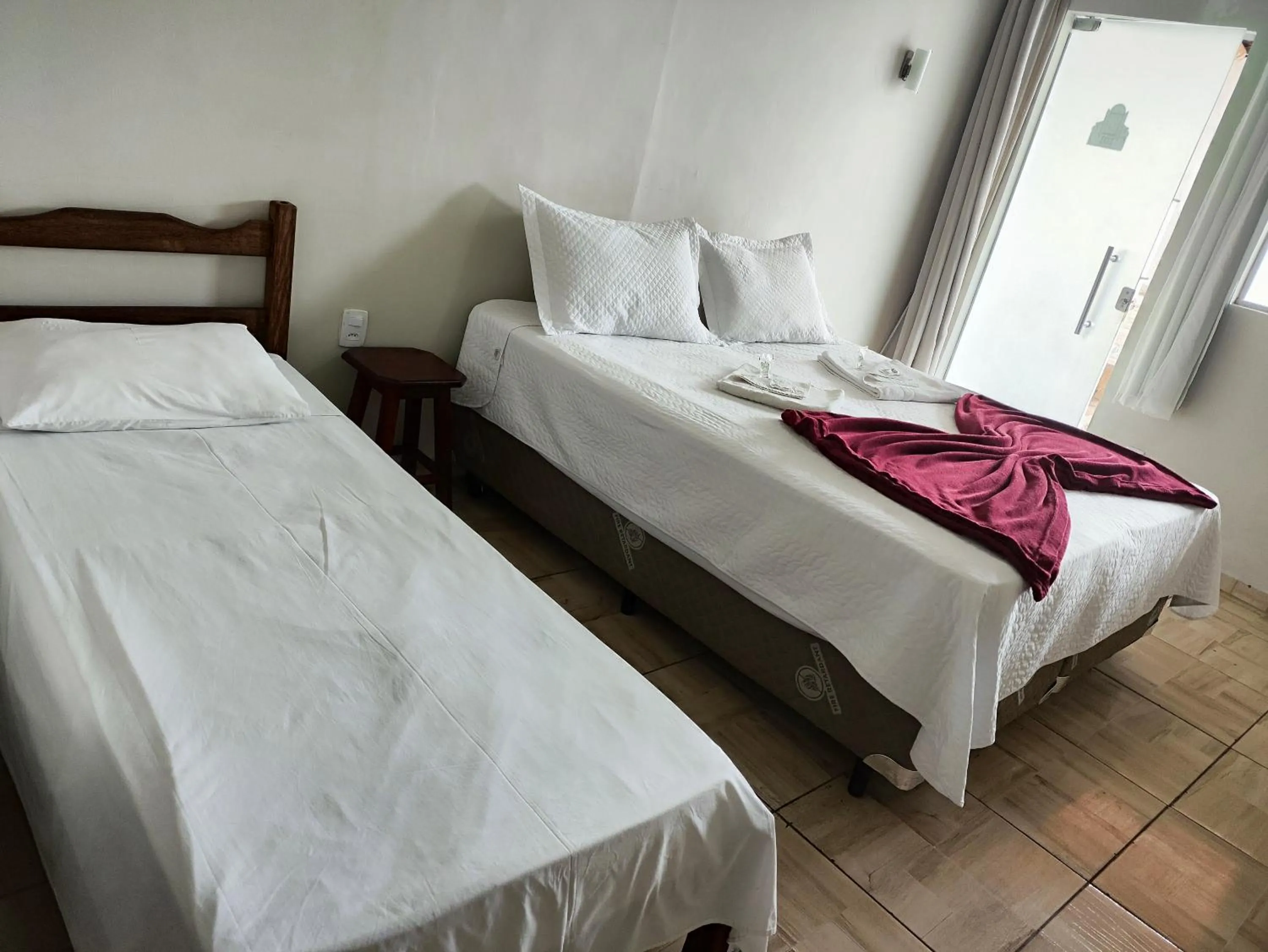Bed in Pousada Sinhá Moça