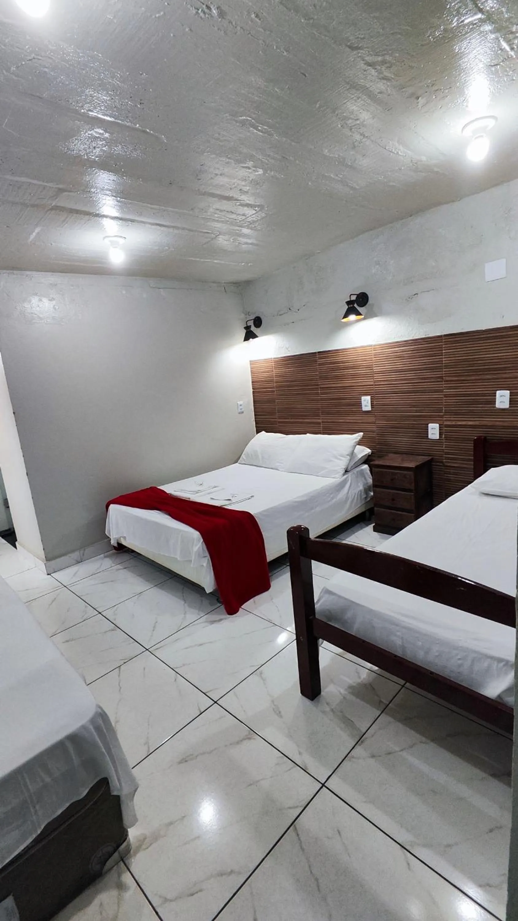 Bed in Pousada Sinhá Moça