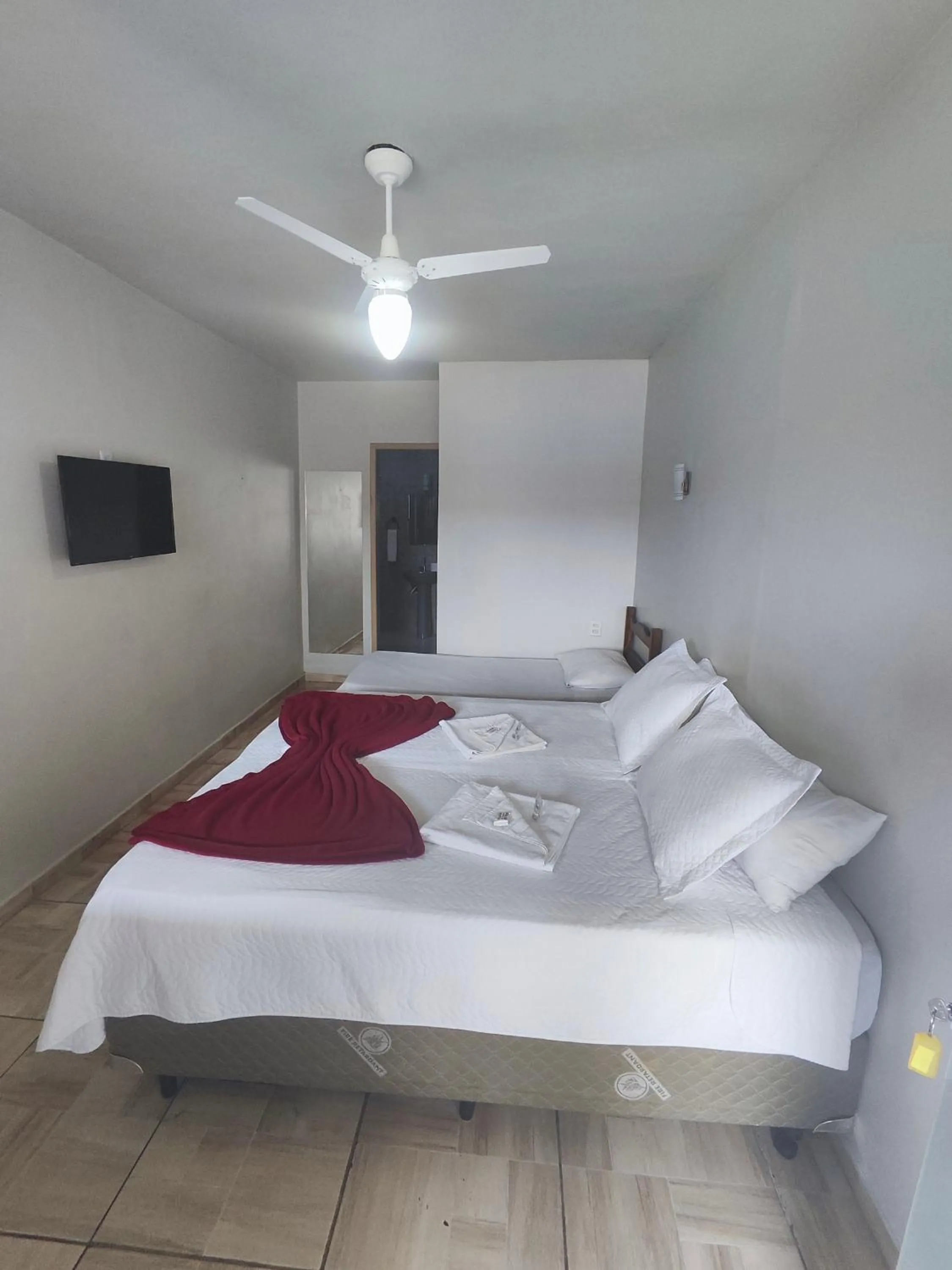 Bed in Pousada Sinhá Moça