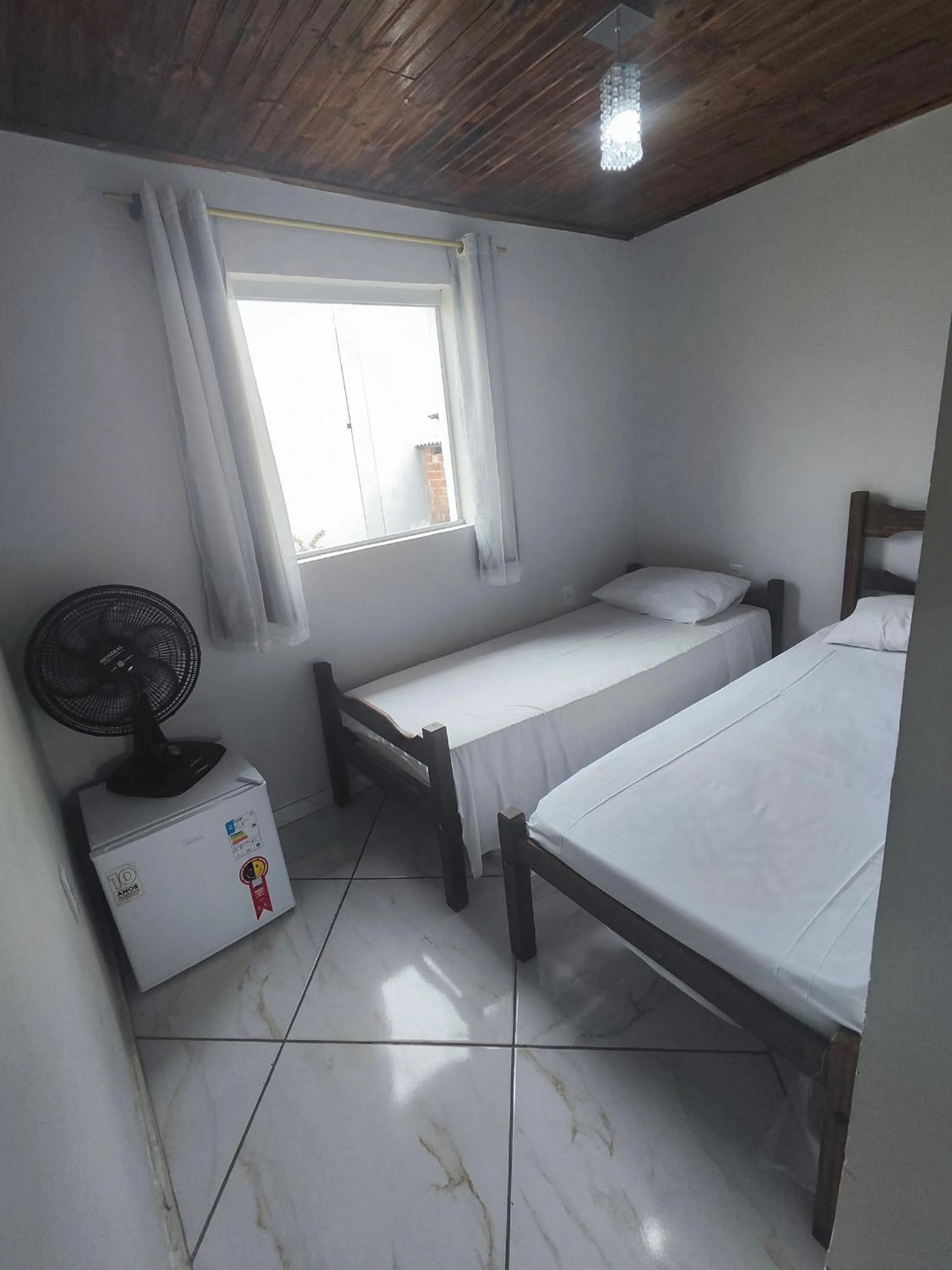 Bed in Pousada Sinhá Moça