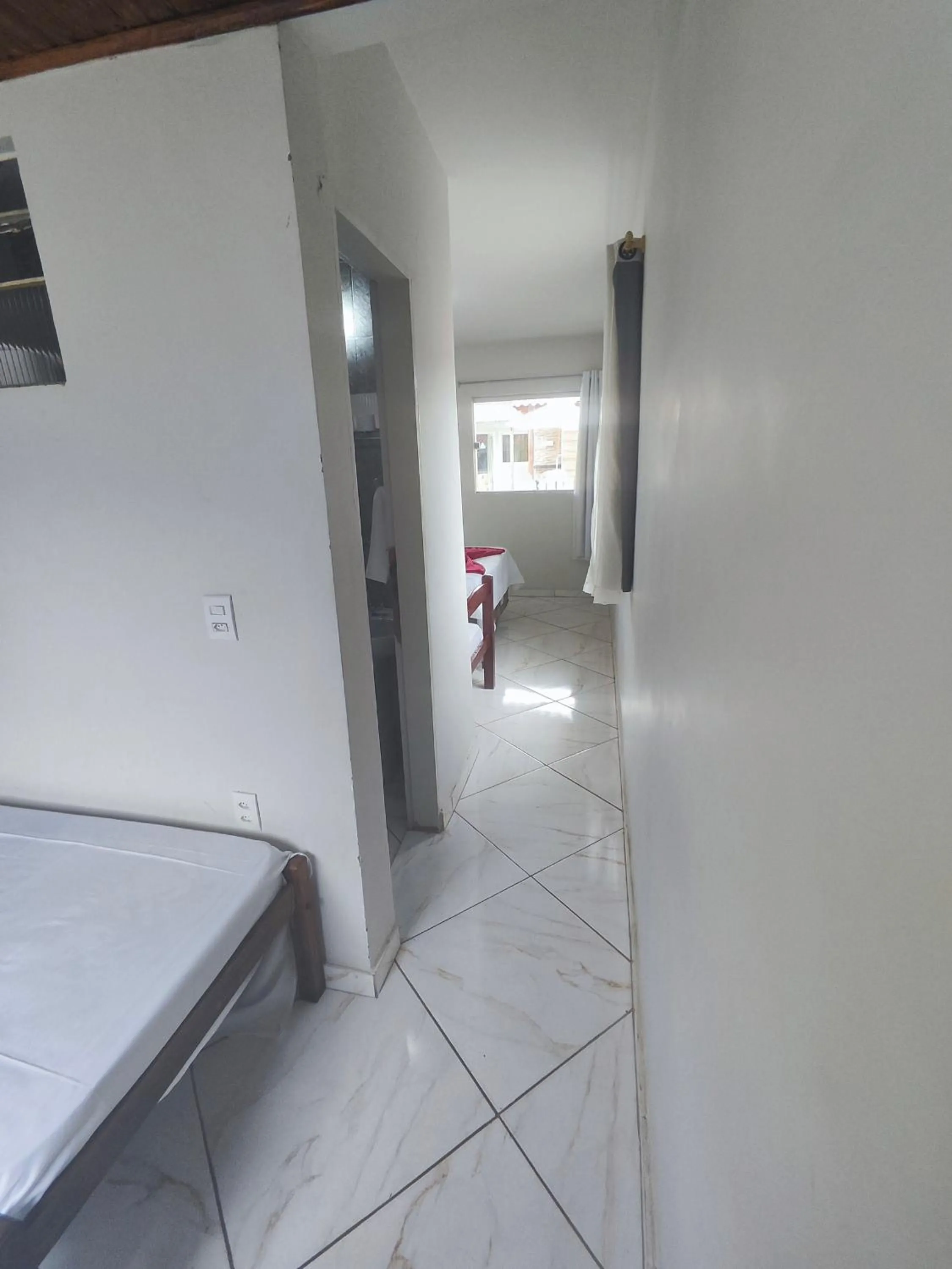 Bed in Pousada Sinhá Moça