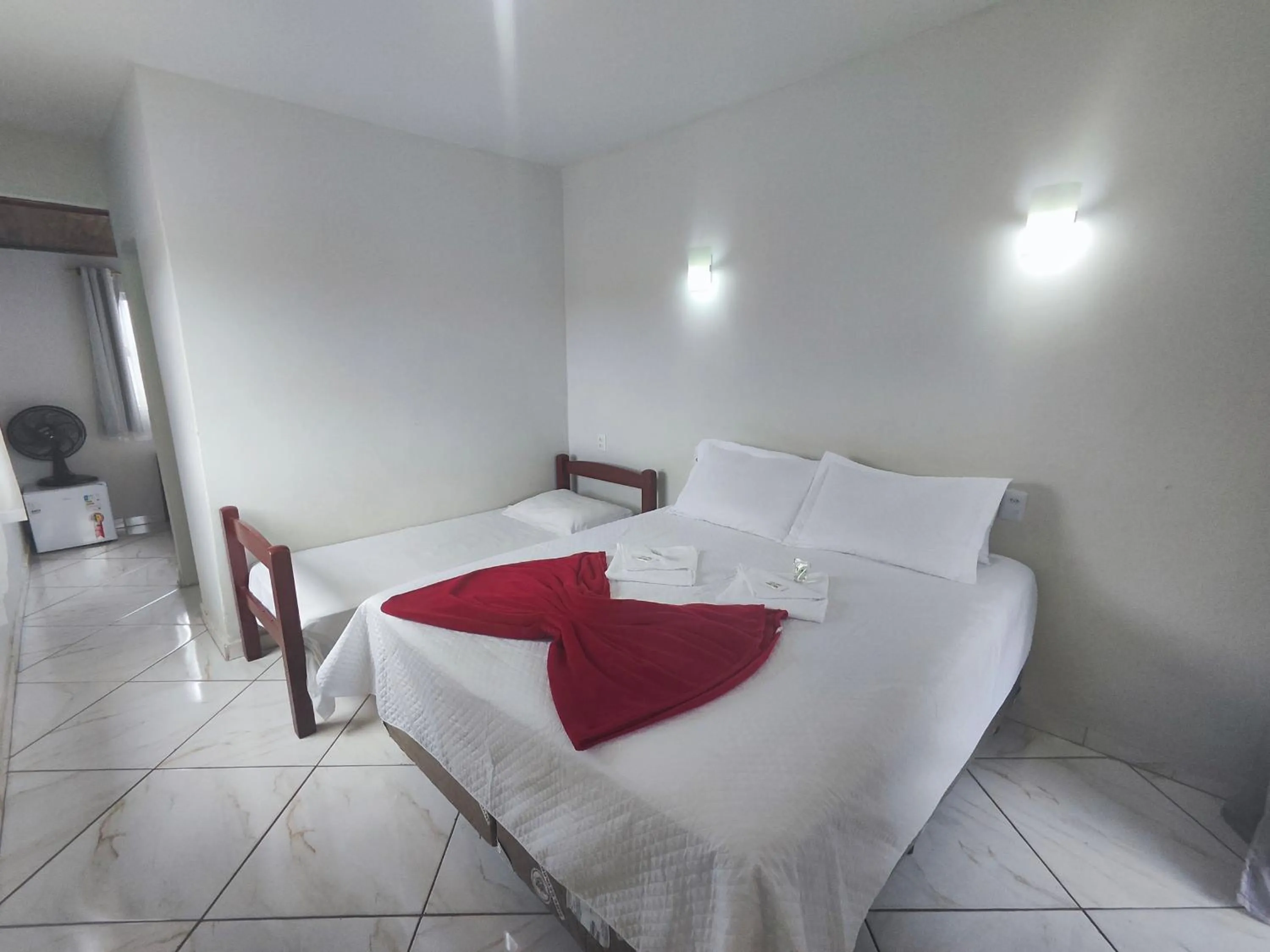 Bed in Pousada Sinhá Moça