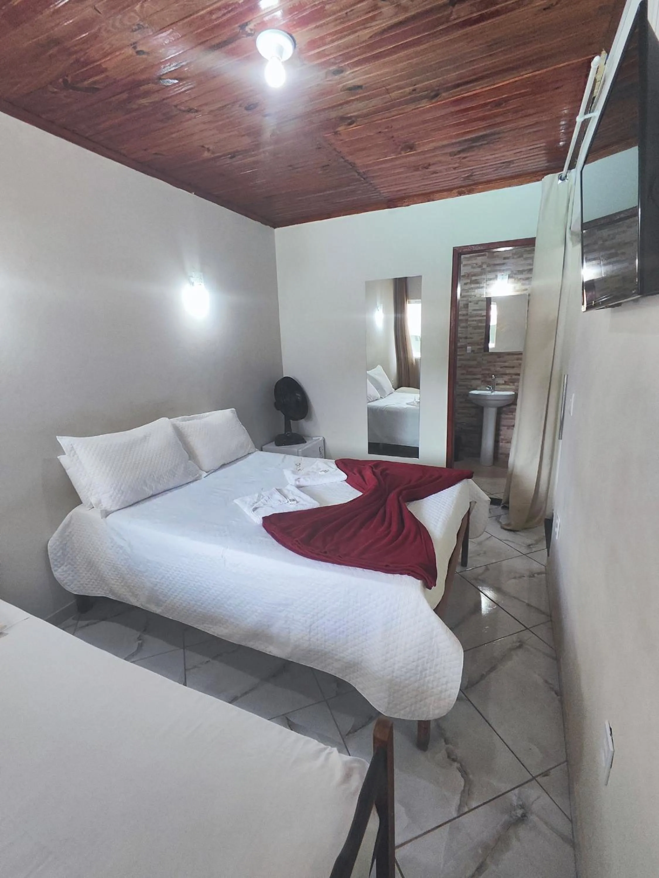 Bed in Pousada Sinhá Moça