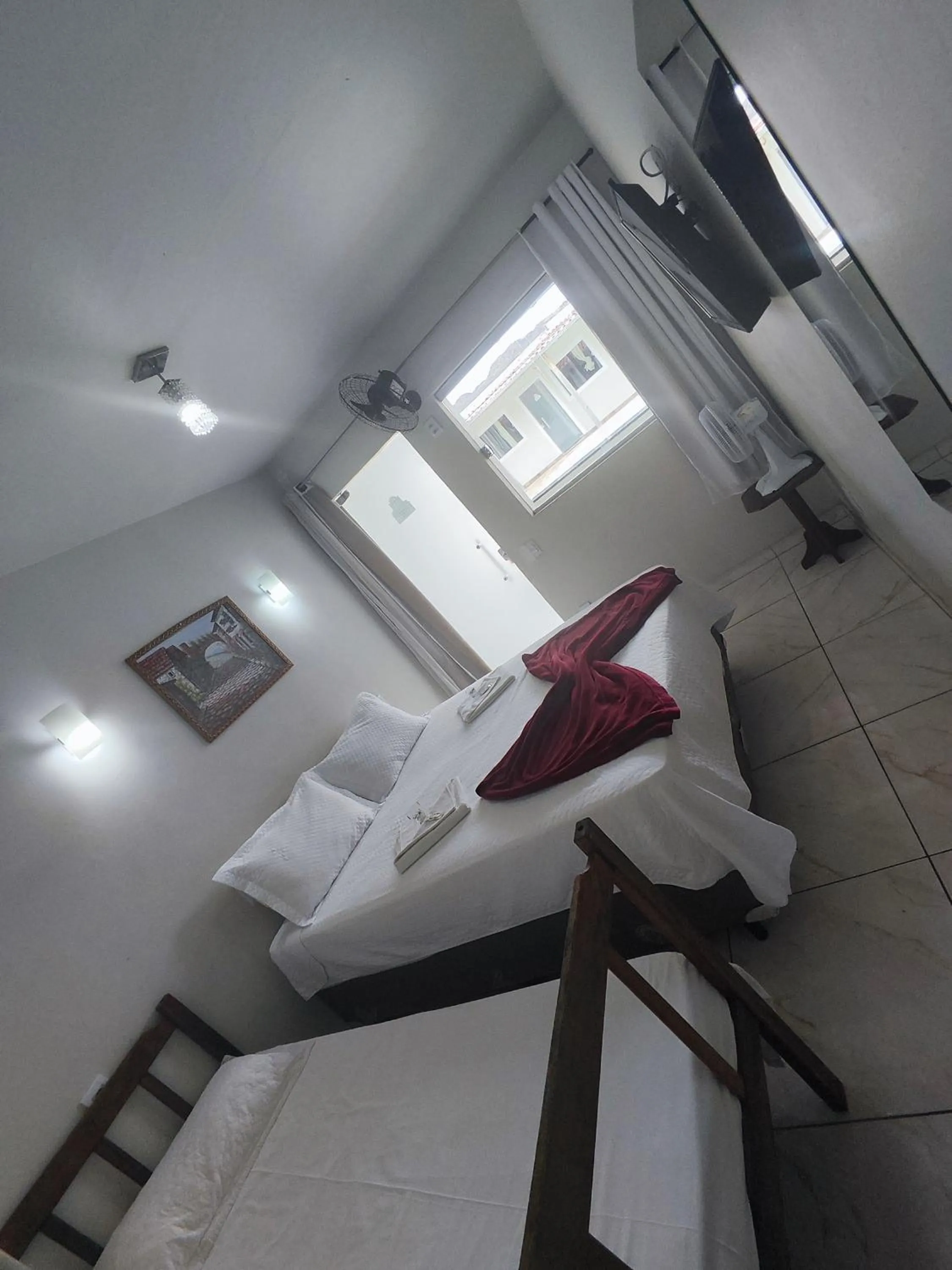 Bed in Pousada Sinhá Moça