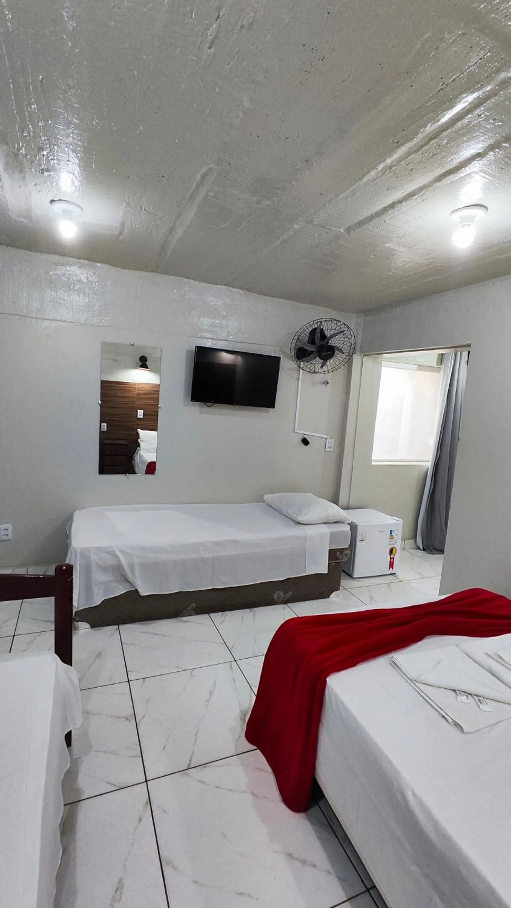 Bed in Pousada Sinhá Moça