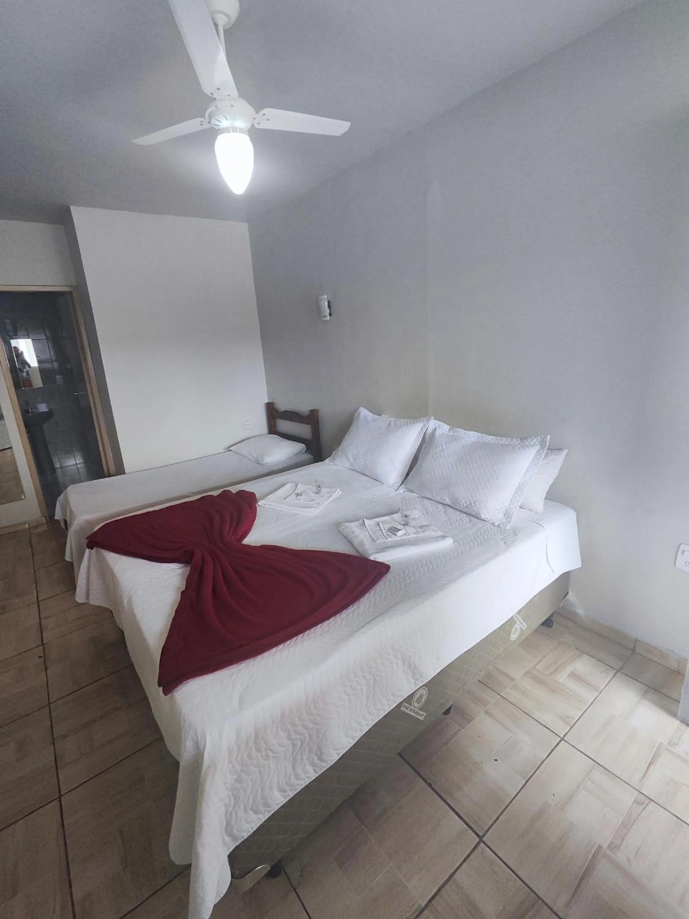 Bed in Pousada Sinhá Moça