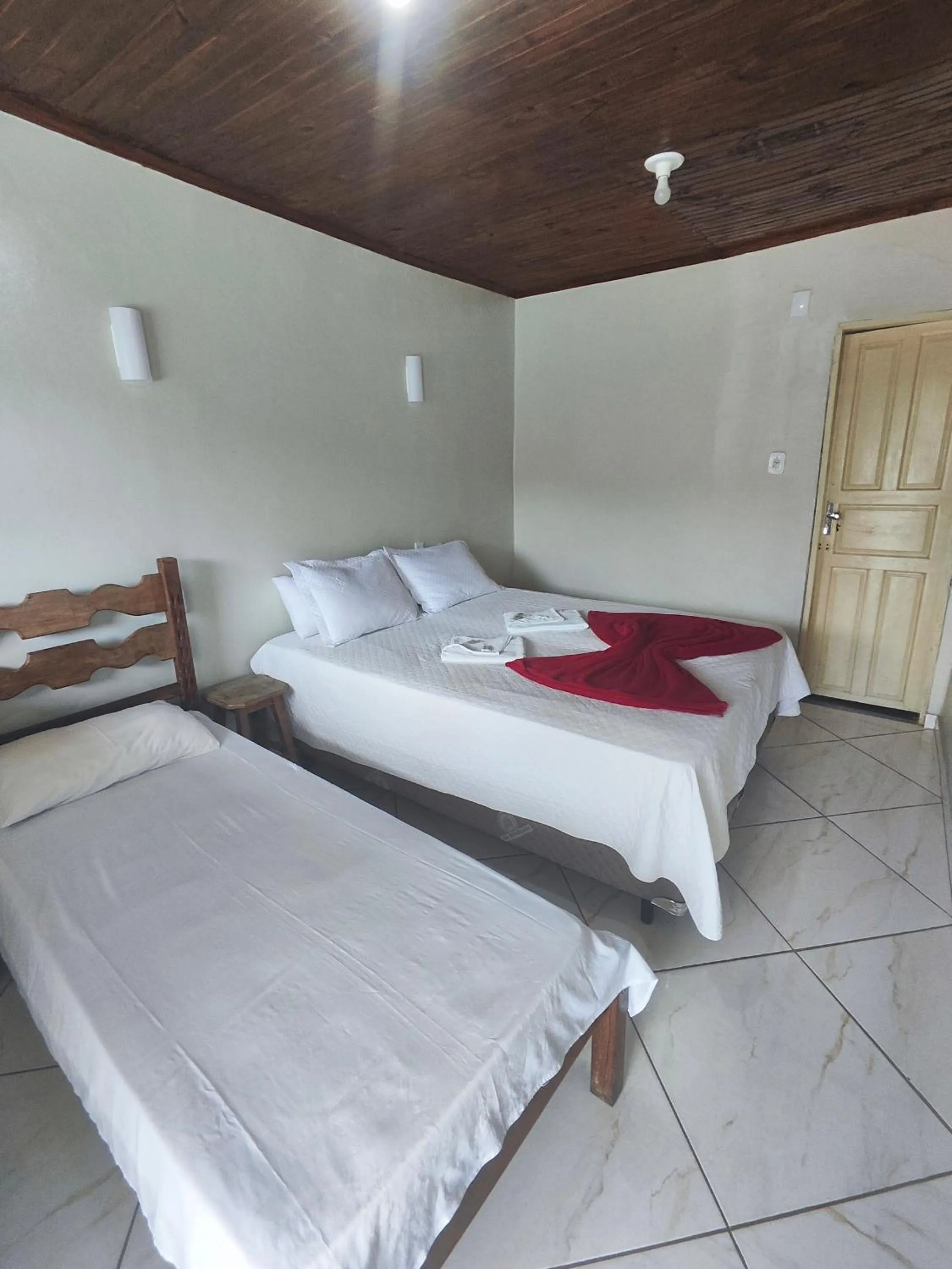 Bed in Pousada Sinhá Moça