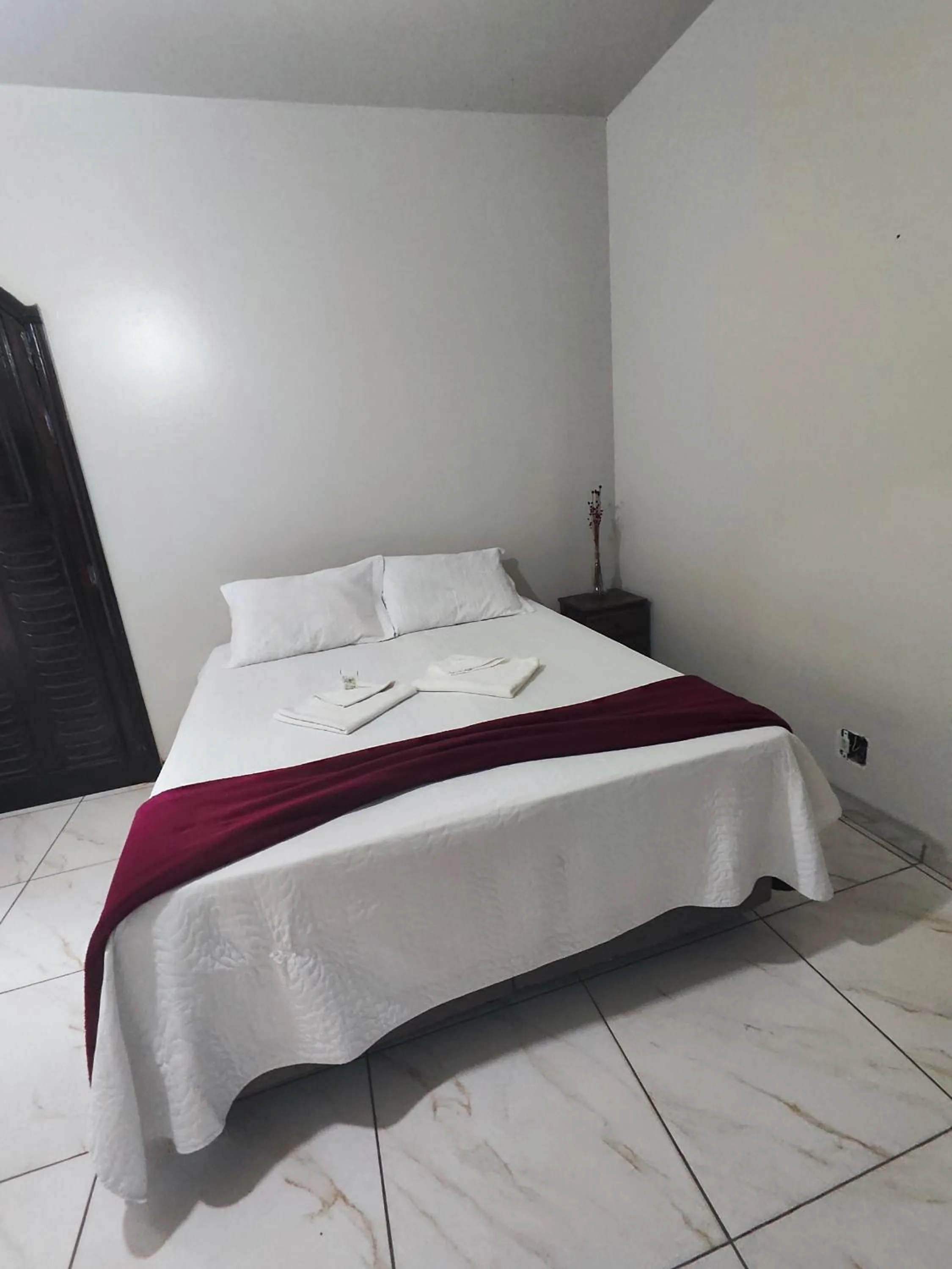 Bed in Pousada Sinhá Moça