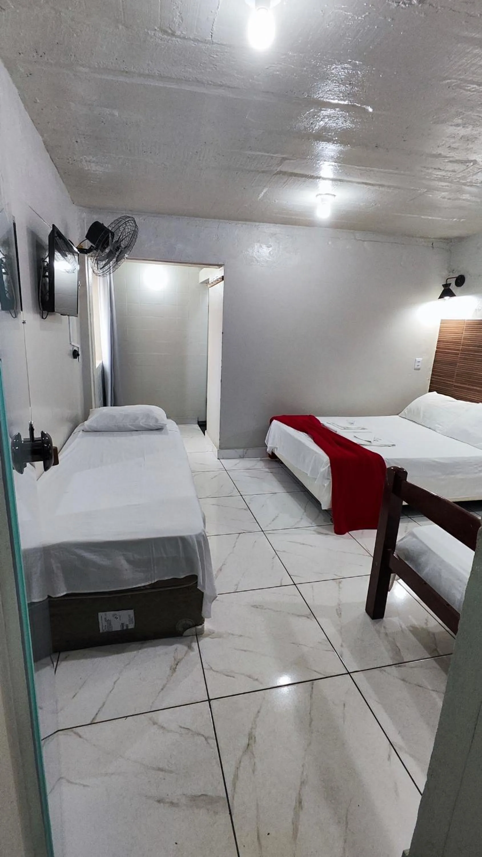 Bed in Pousada Sinhá Moça
