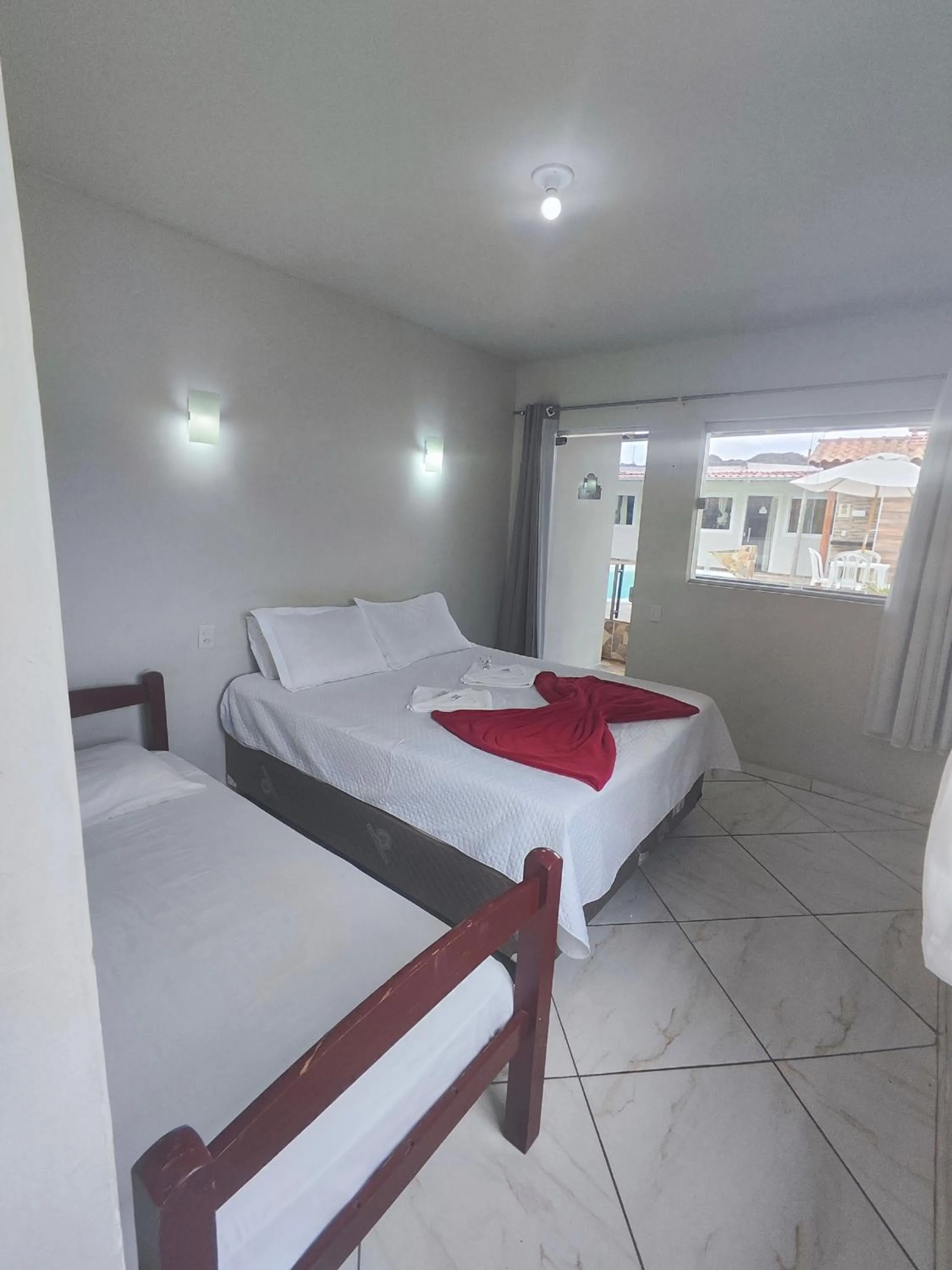 Bed in Pousada Sinhá Moça