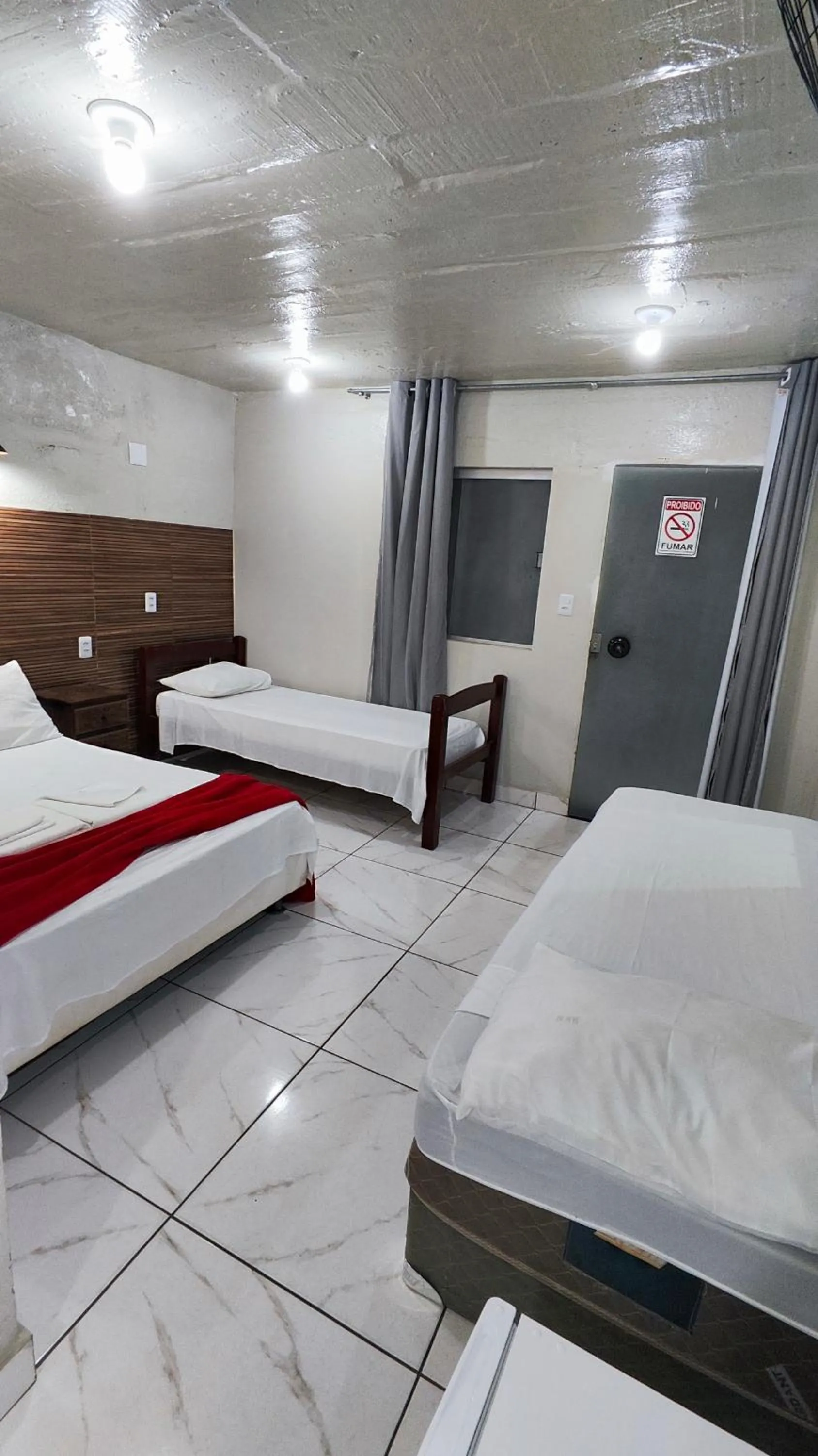Bed in Pousada Sinhá Moça