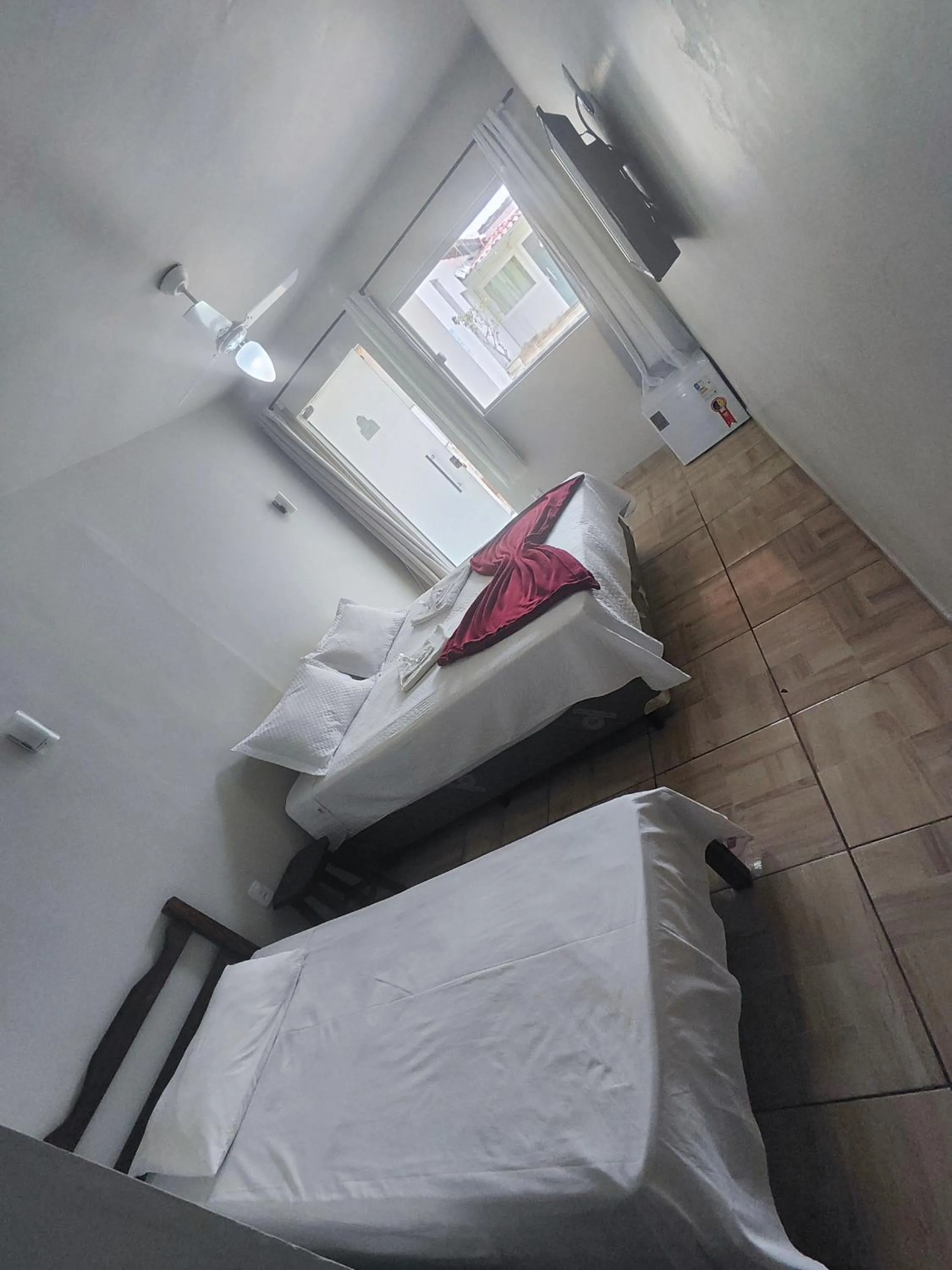 Bed in Pousada Sinhá Moça