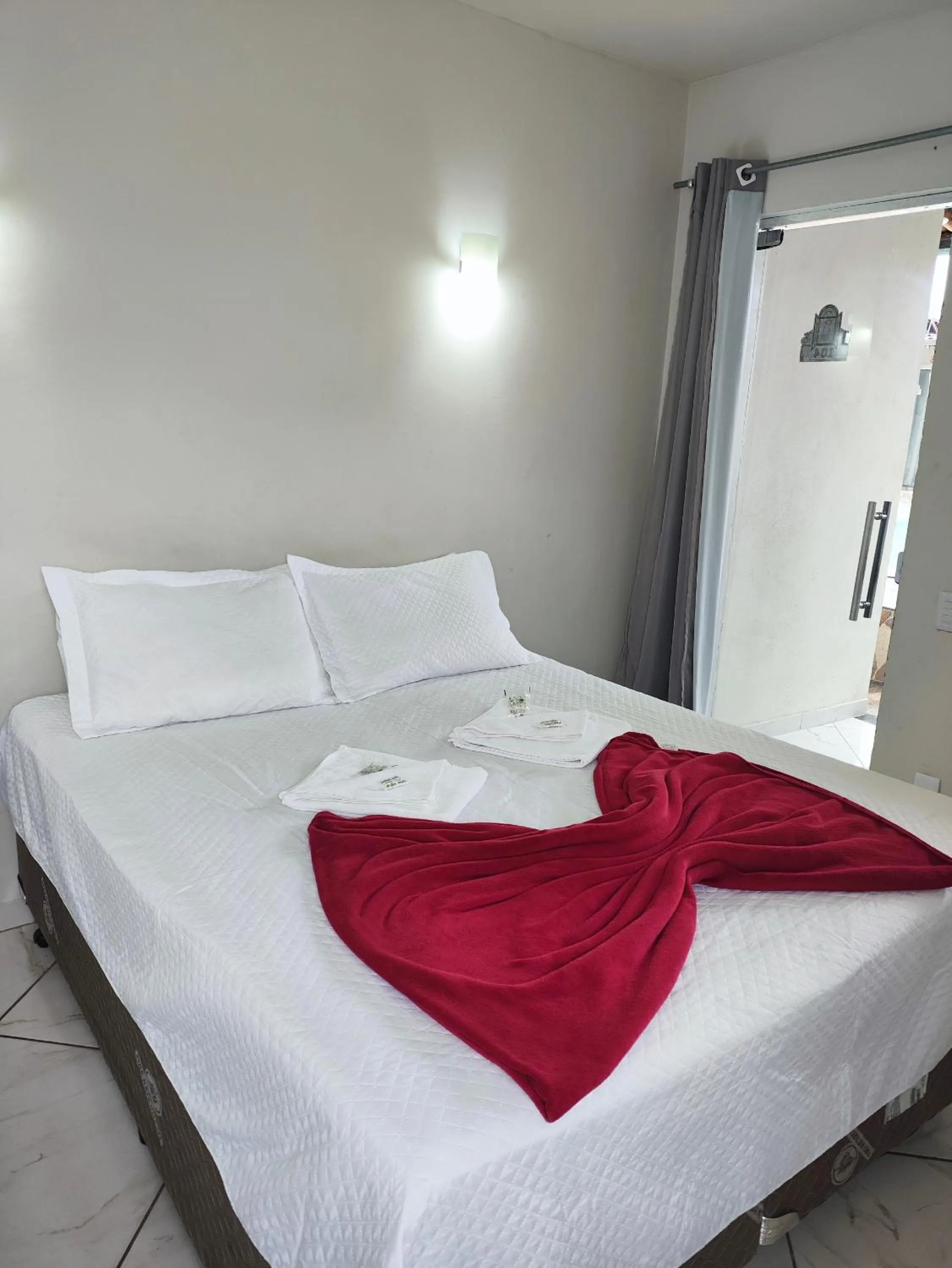 Bed in Pousada Sinhá Moça