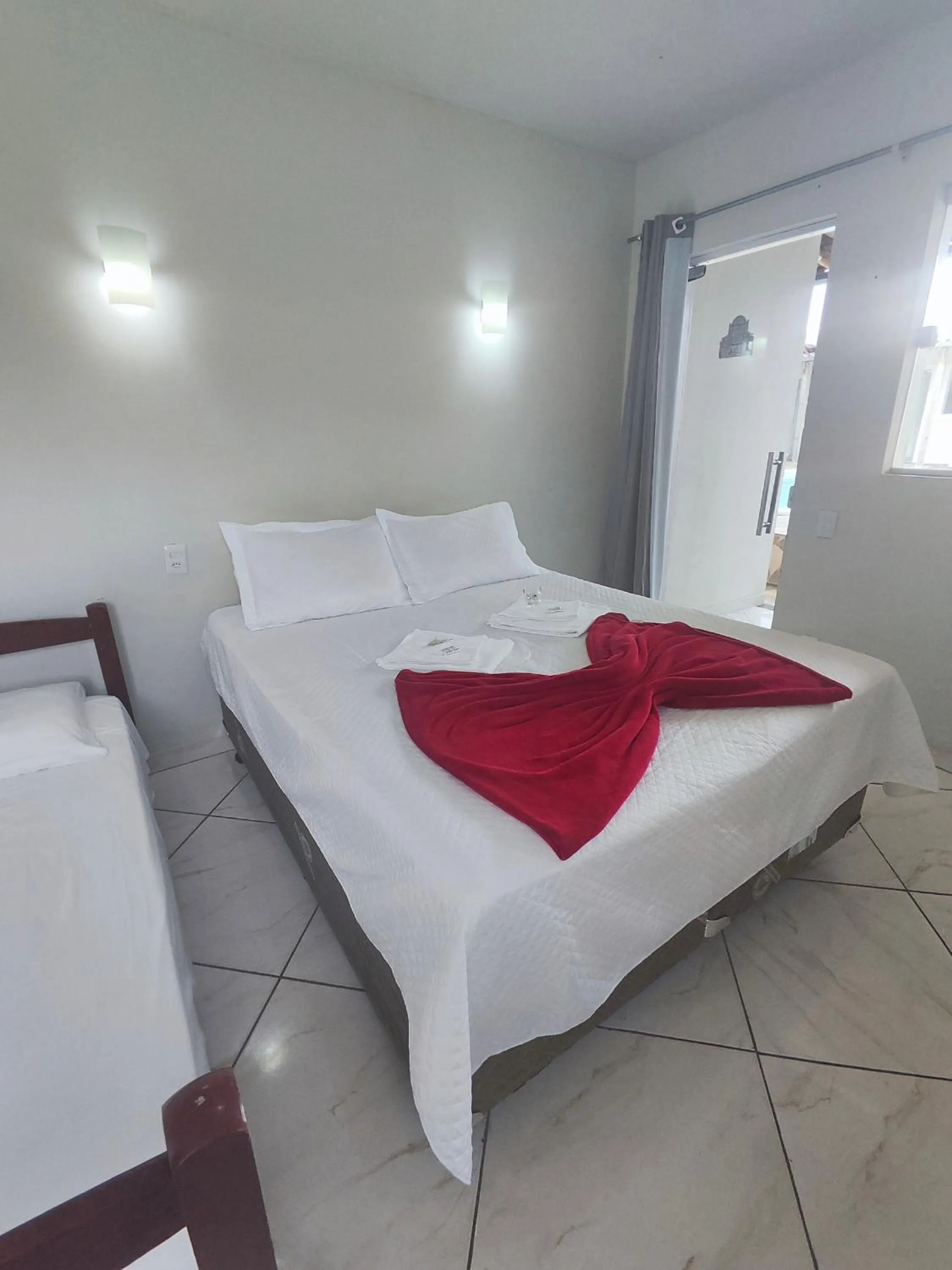 Bed in Pousada Sinhá Moça