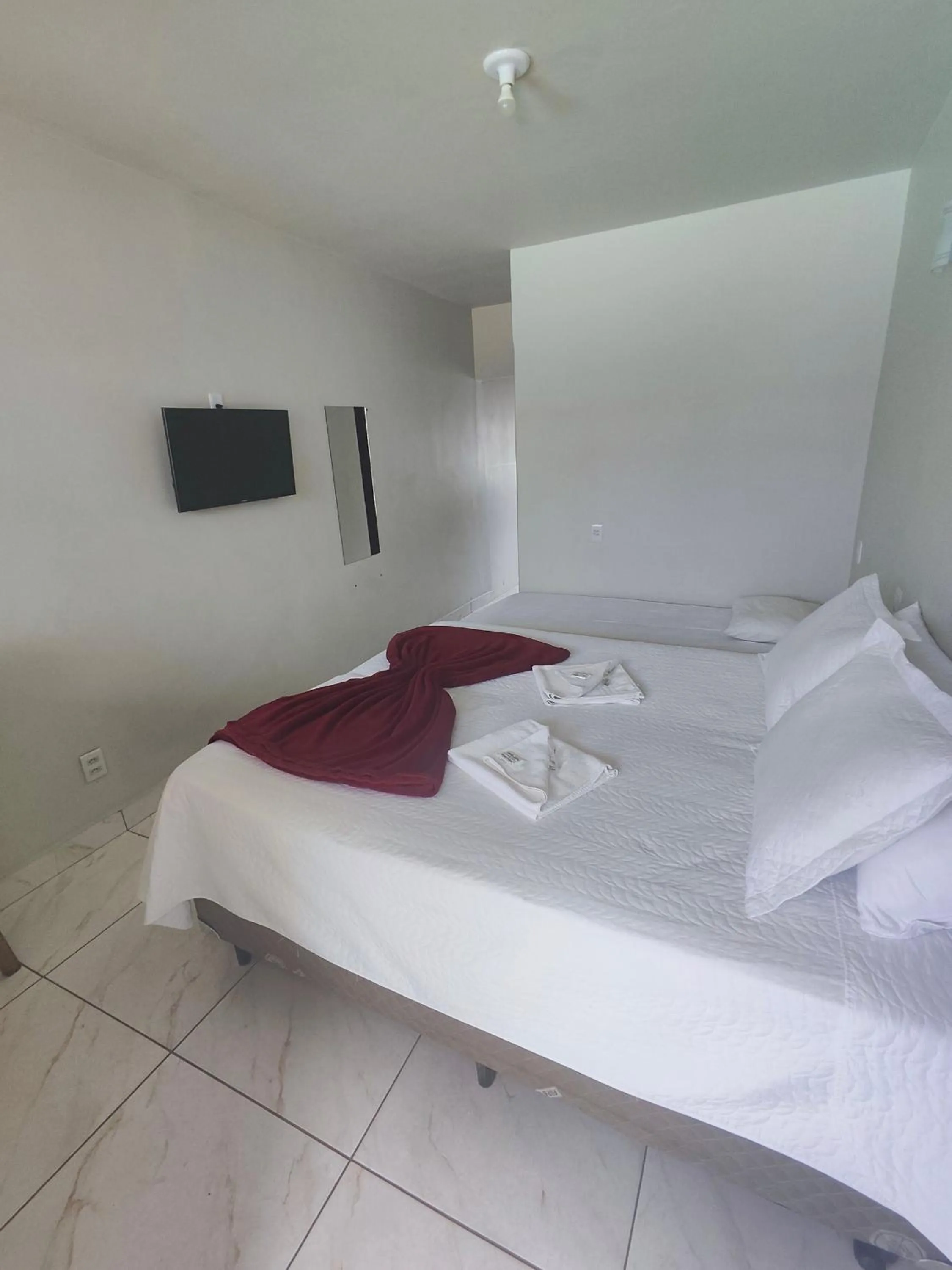 Bed in Pousada Sinhá Moça
