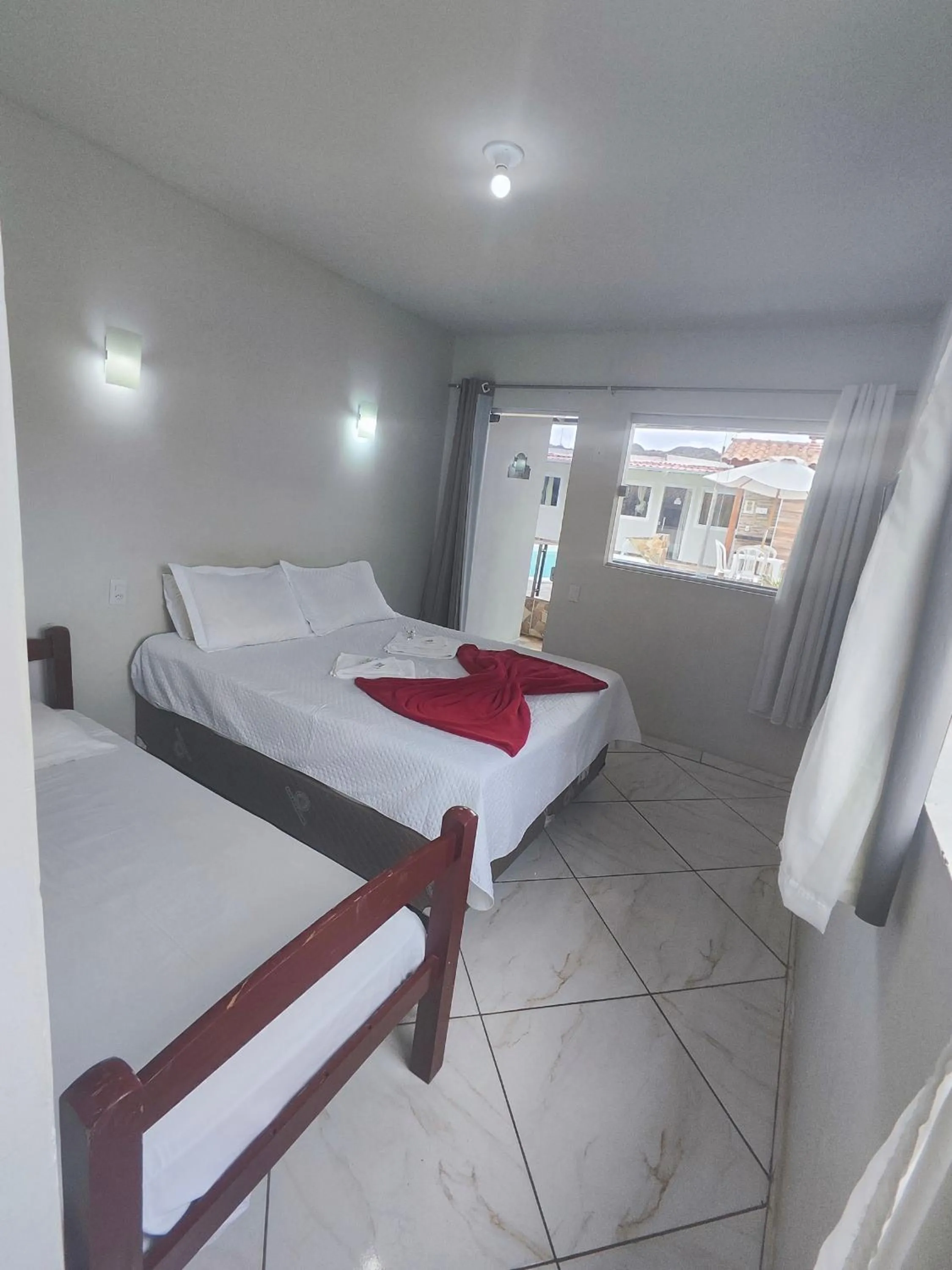 Bed in Pousada Sinhá Moça