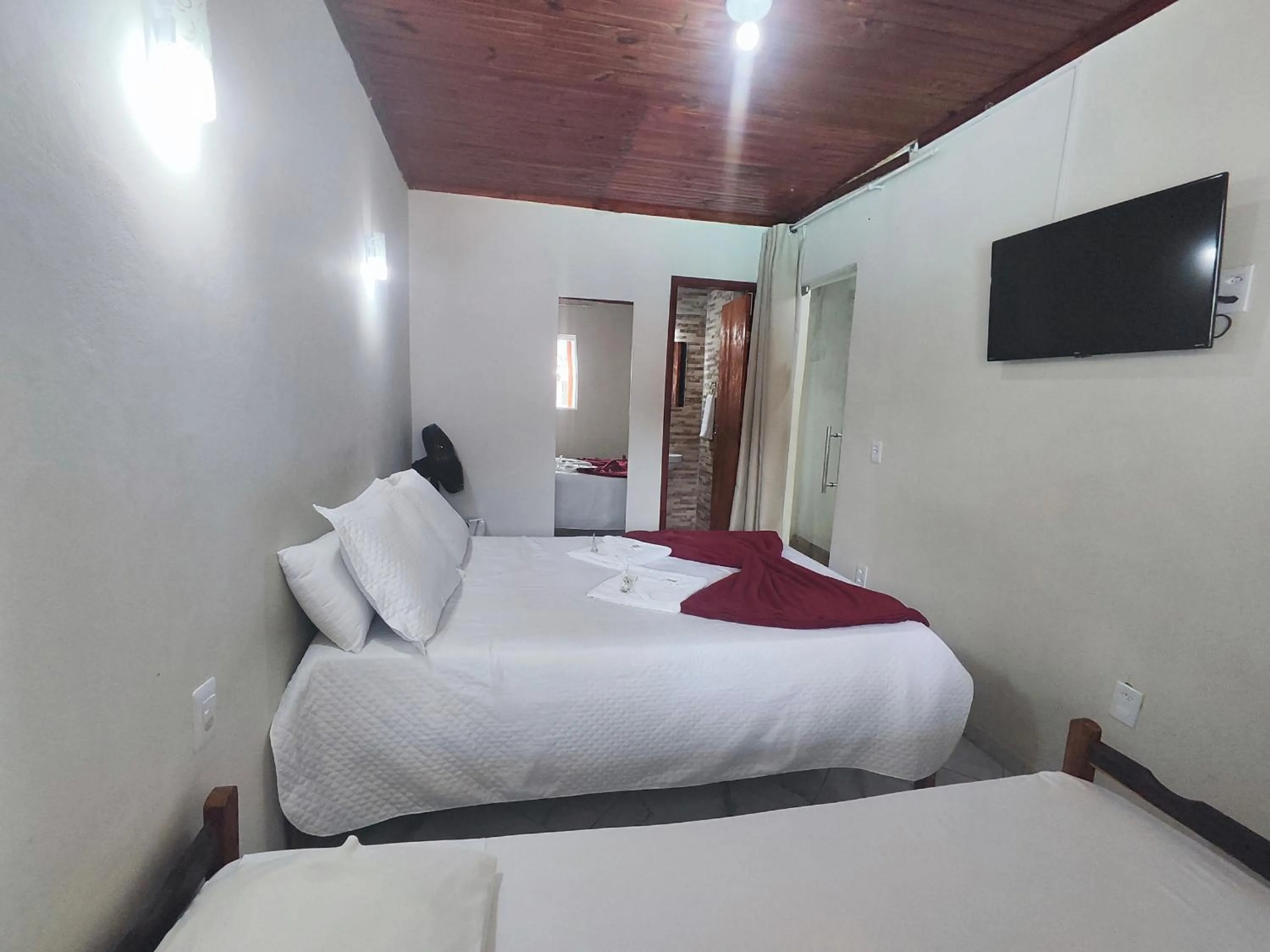 Bed in Pousada Sinhá Moça