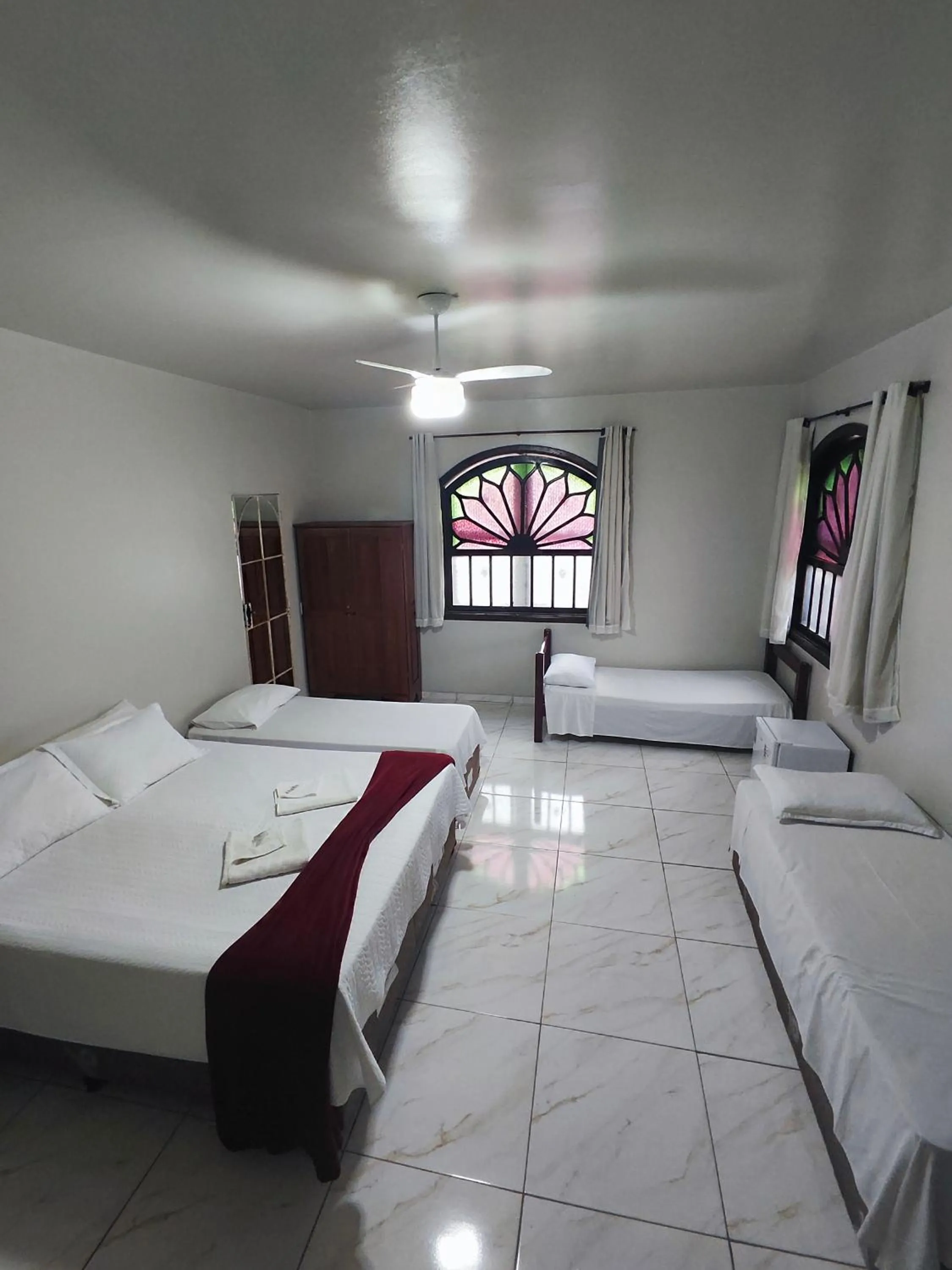 Bed in Pousada Sinhá Moça