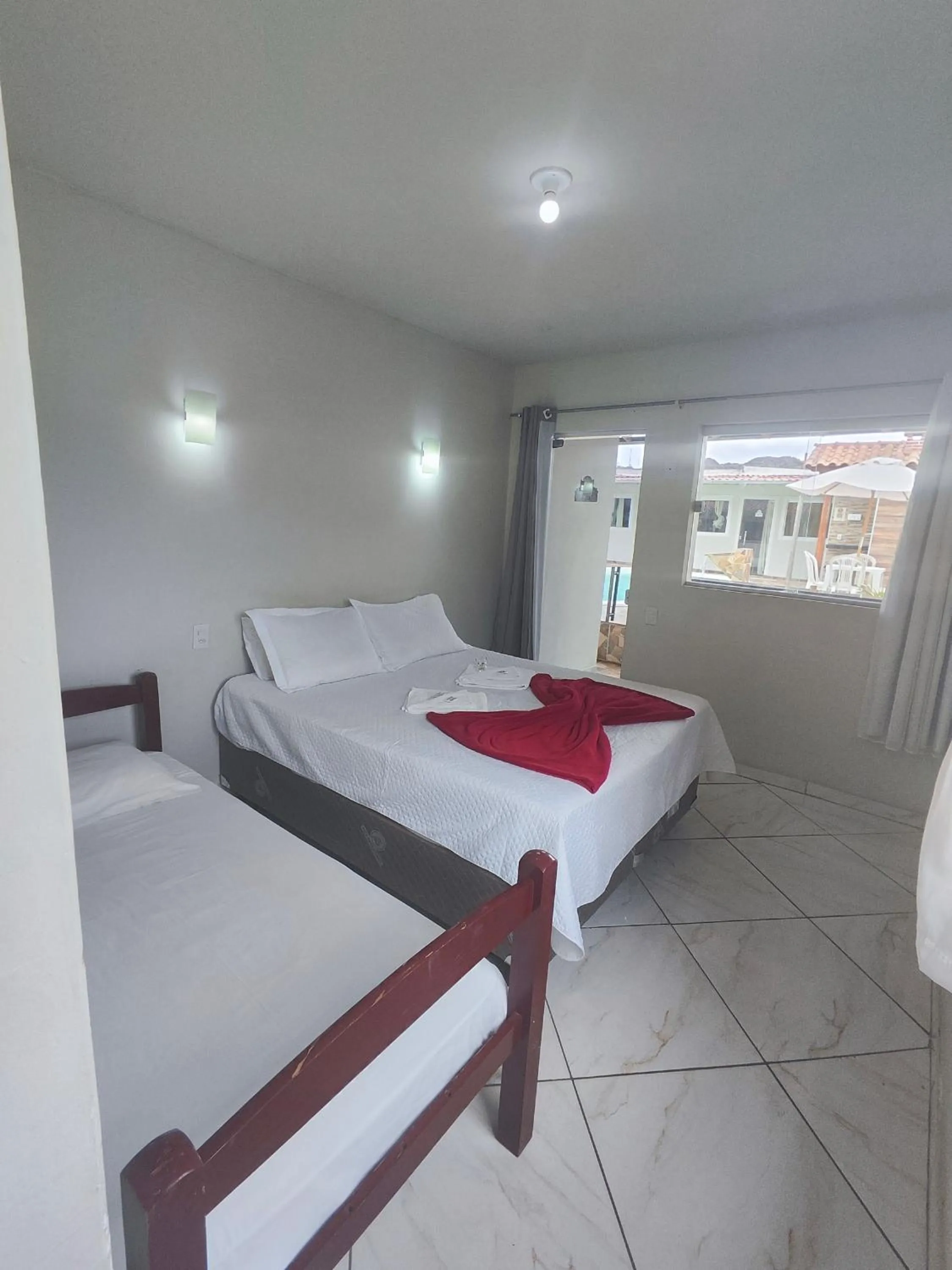Bed in Pousada Sinhá Moça