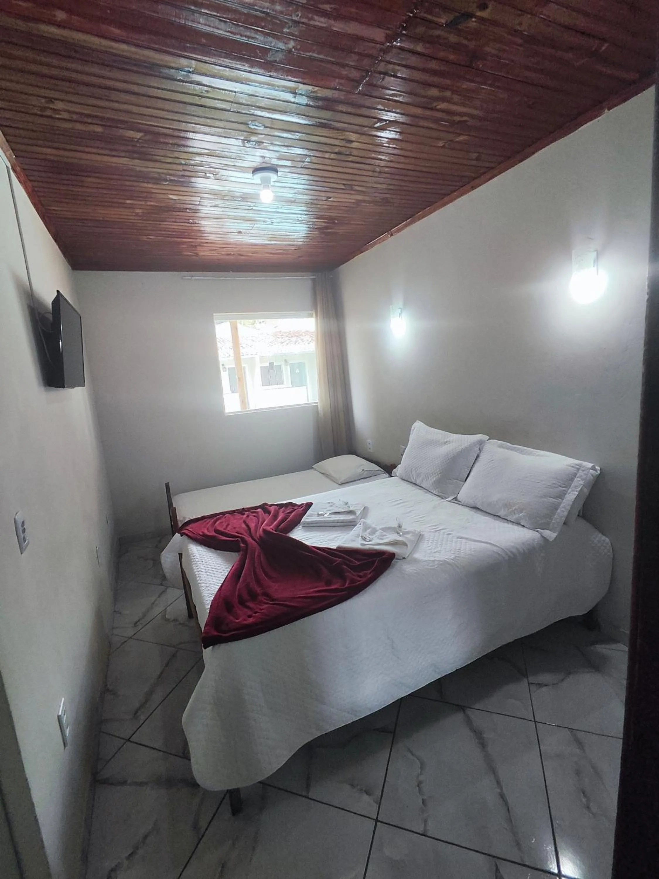 Bed in Pousada Sinhá Moça