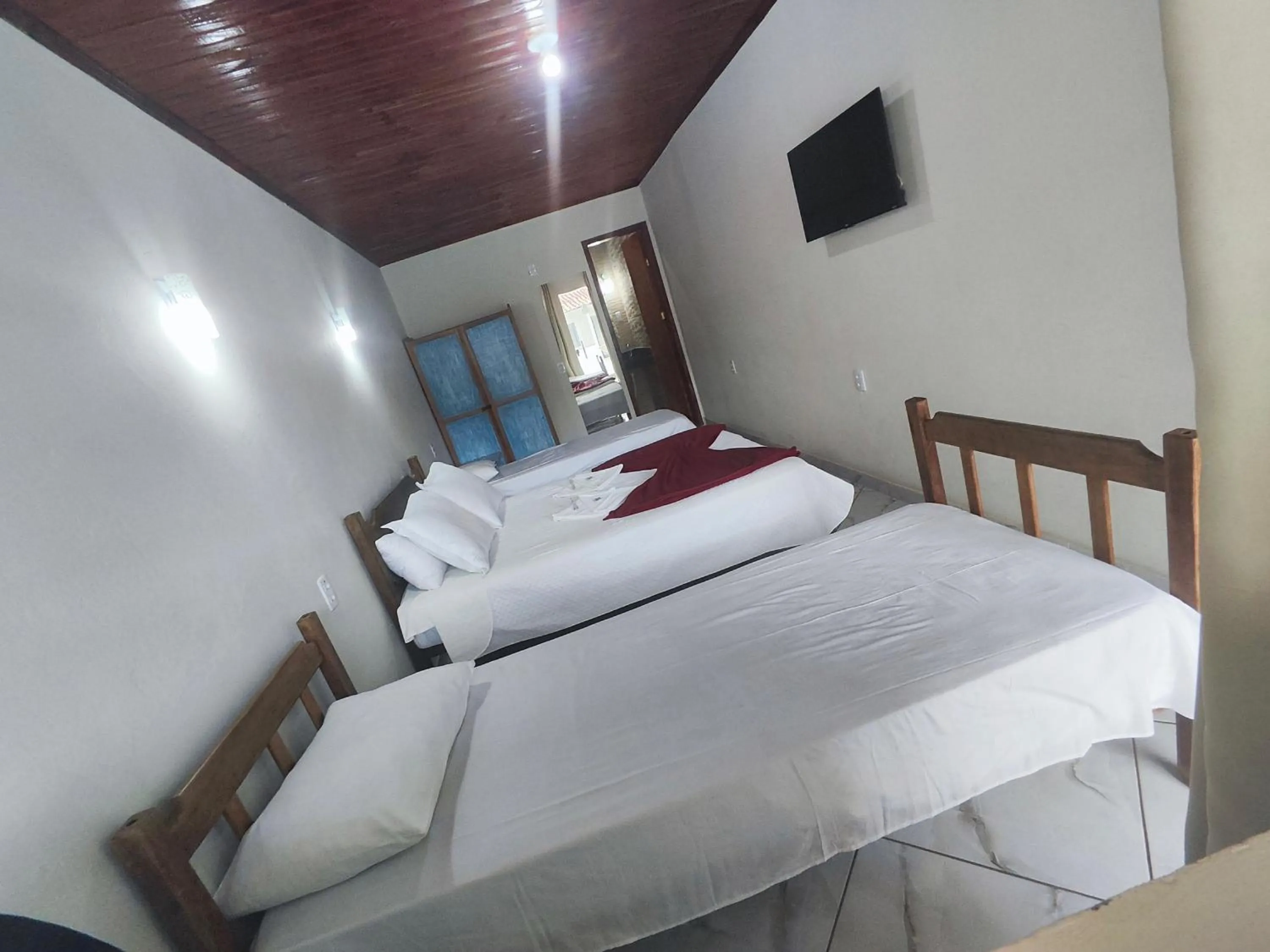 Bed in Pousada Sinhá Moça