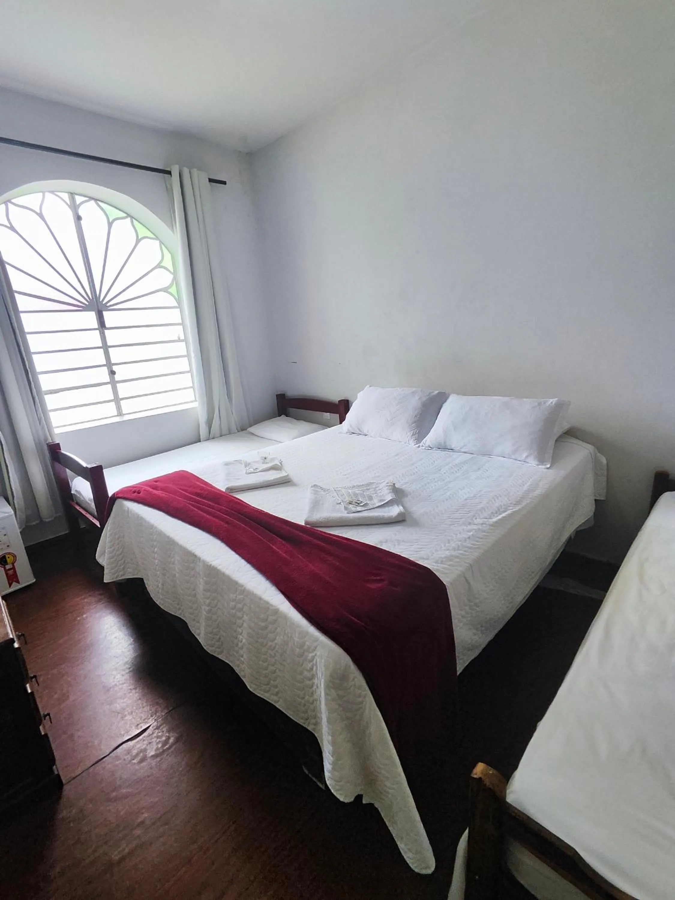 Bed in Pousada Sinhá Moça